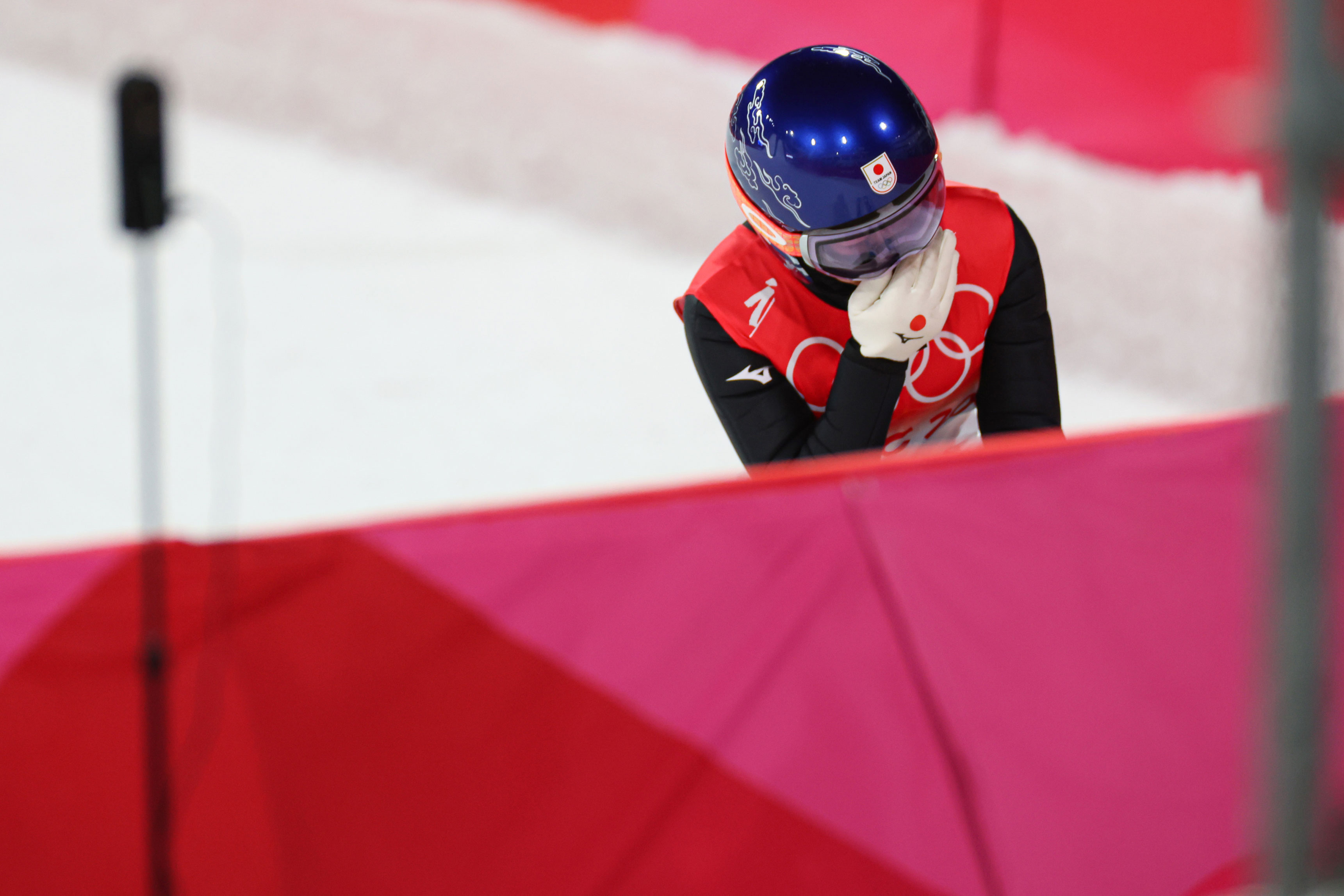 Japanese ski jumper Sara Takanashi is dejected after her final-round jump during the mixed team event on Monday.