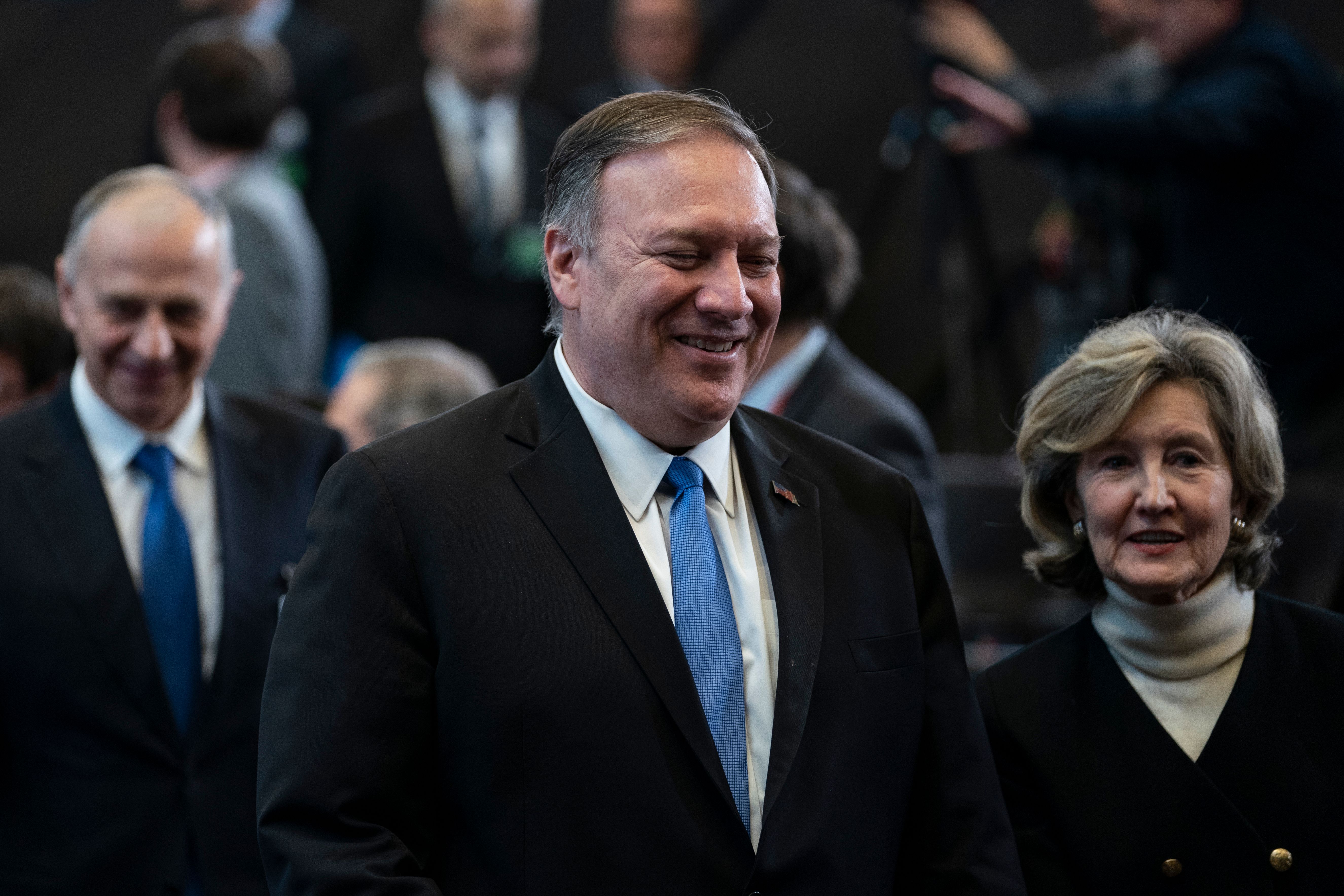 US Secretary of State Mike Pompeo (C) arrives for a NATO Foreign Affairs ministers' summit in Brussels on Nov. 20.