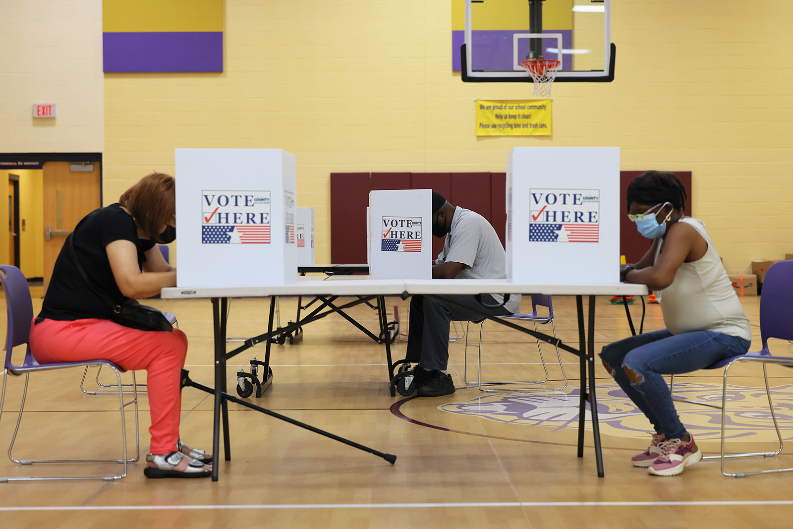 People vote during primary election day at Barack Obama Elementary School on Tuesday in St. Louis, Missouri.