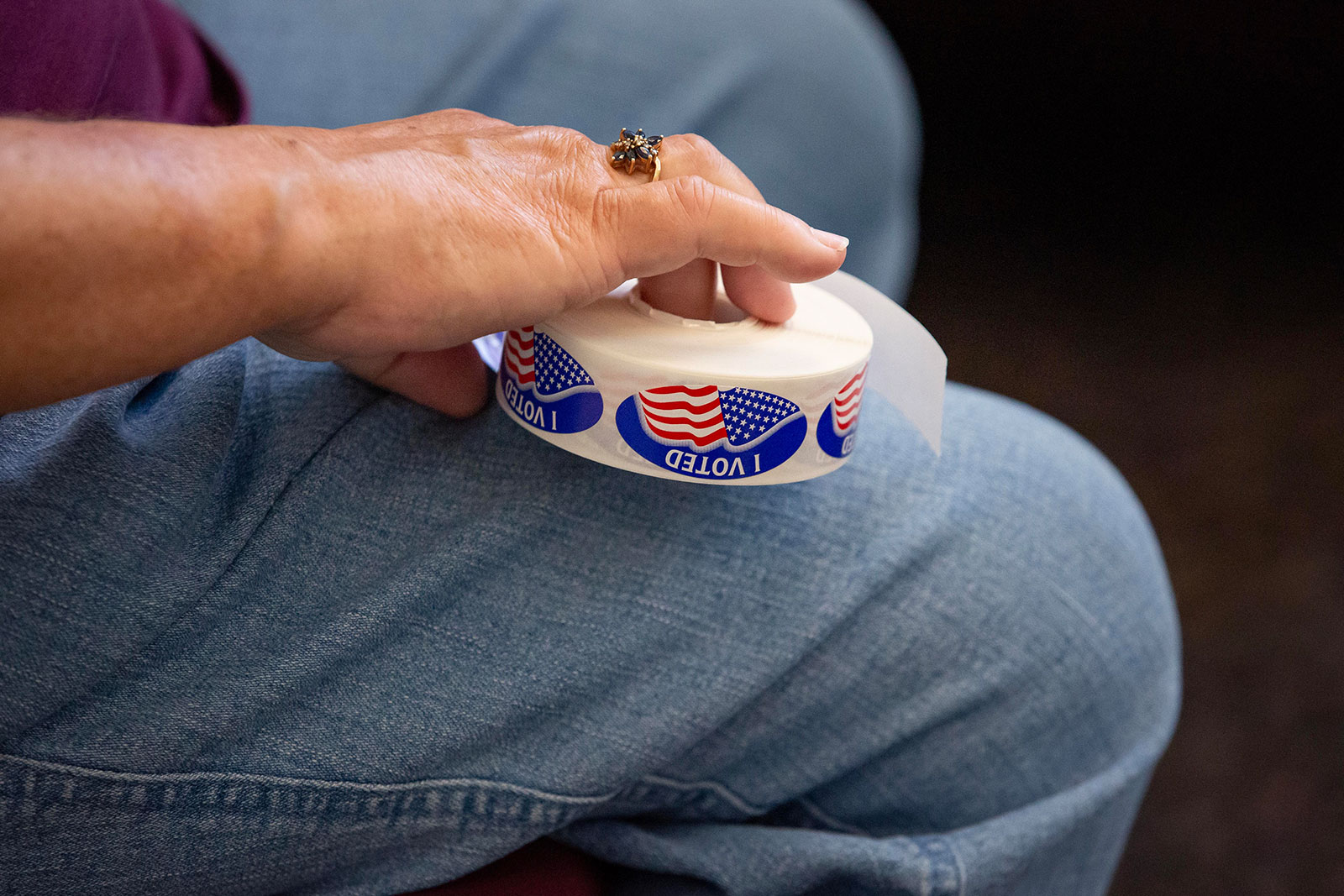 A campaign worker holds stickers at a polling place on November 8 in Fuquay Varina, North Carolina. 