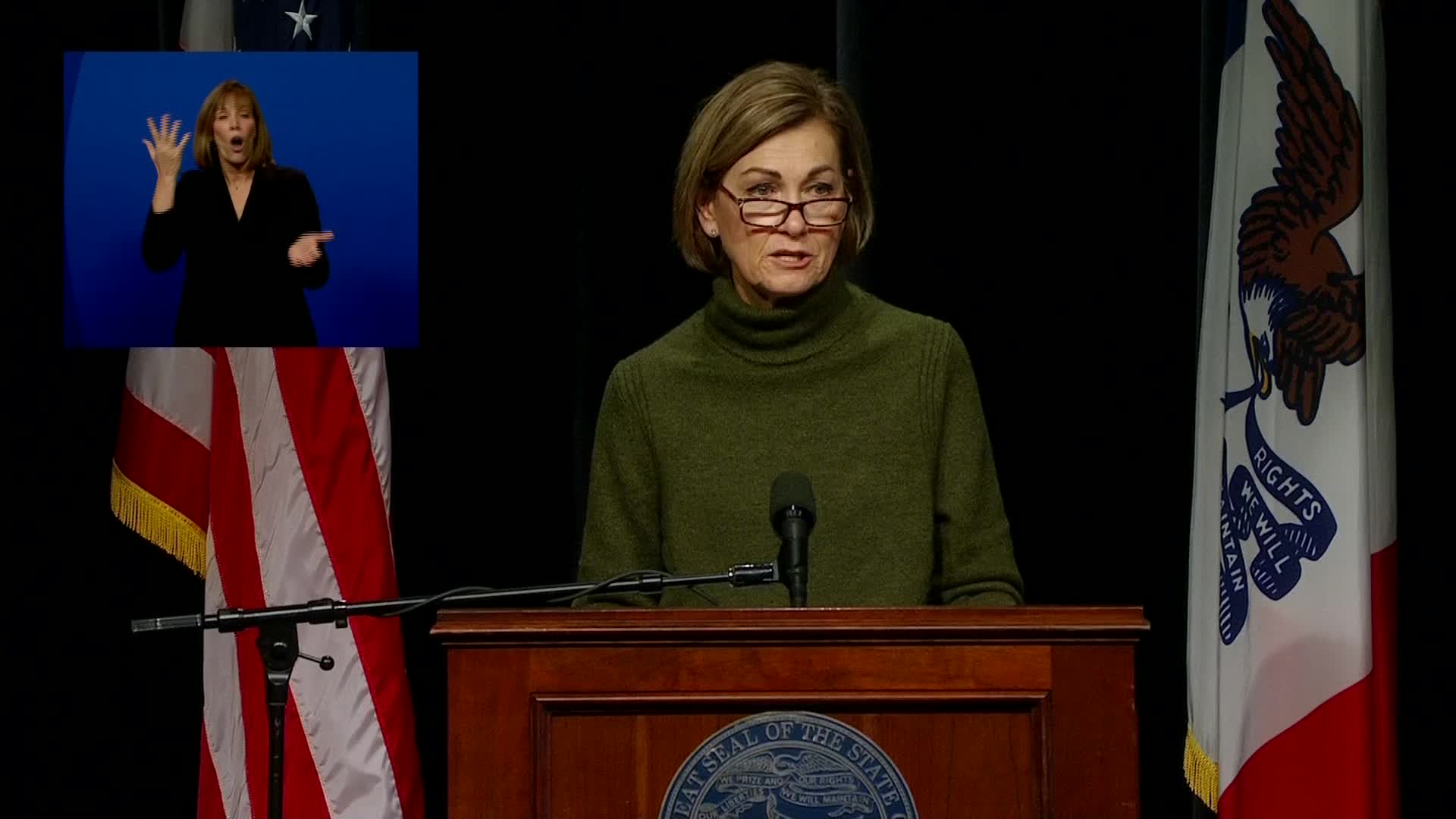 Iowa Gov. Kim Reynolds speaks during a press conference in Johnston, Iowa, on December 1.