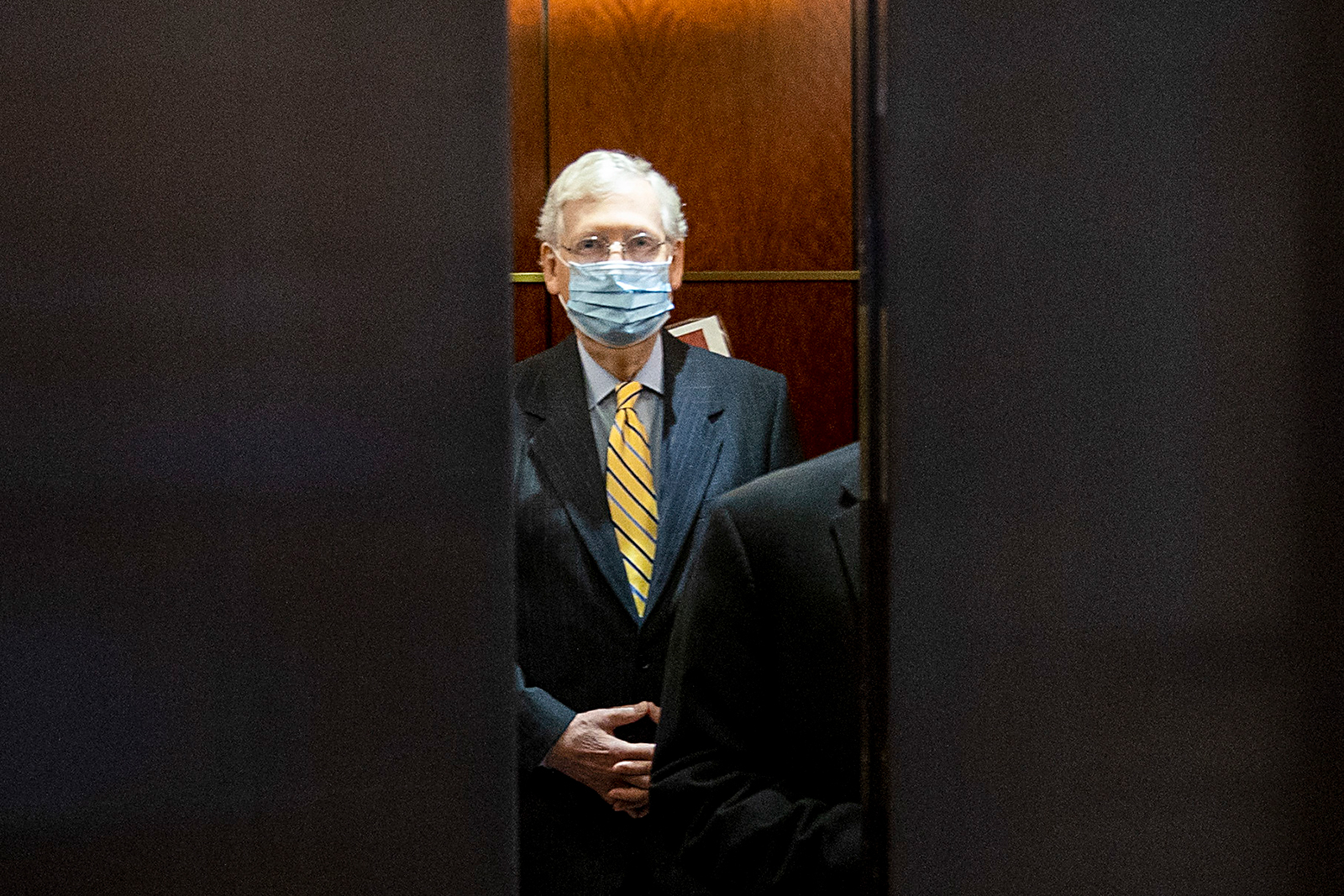Senate Majority Leader Mitch McConnell (R-KY) leaves after a closed door briefing at the US Capitol on July 2 in Washington.