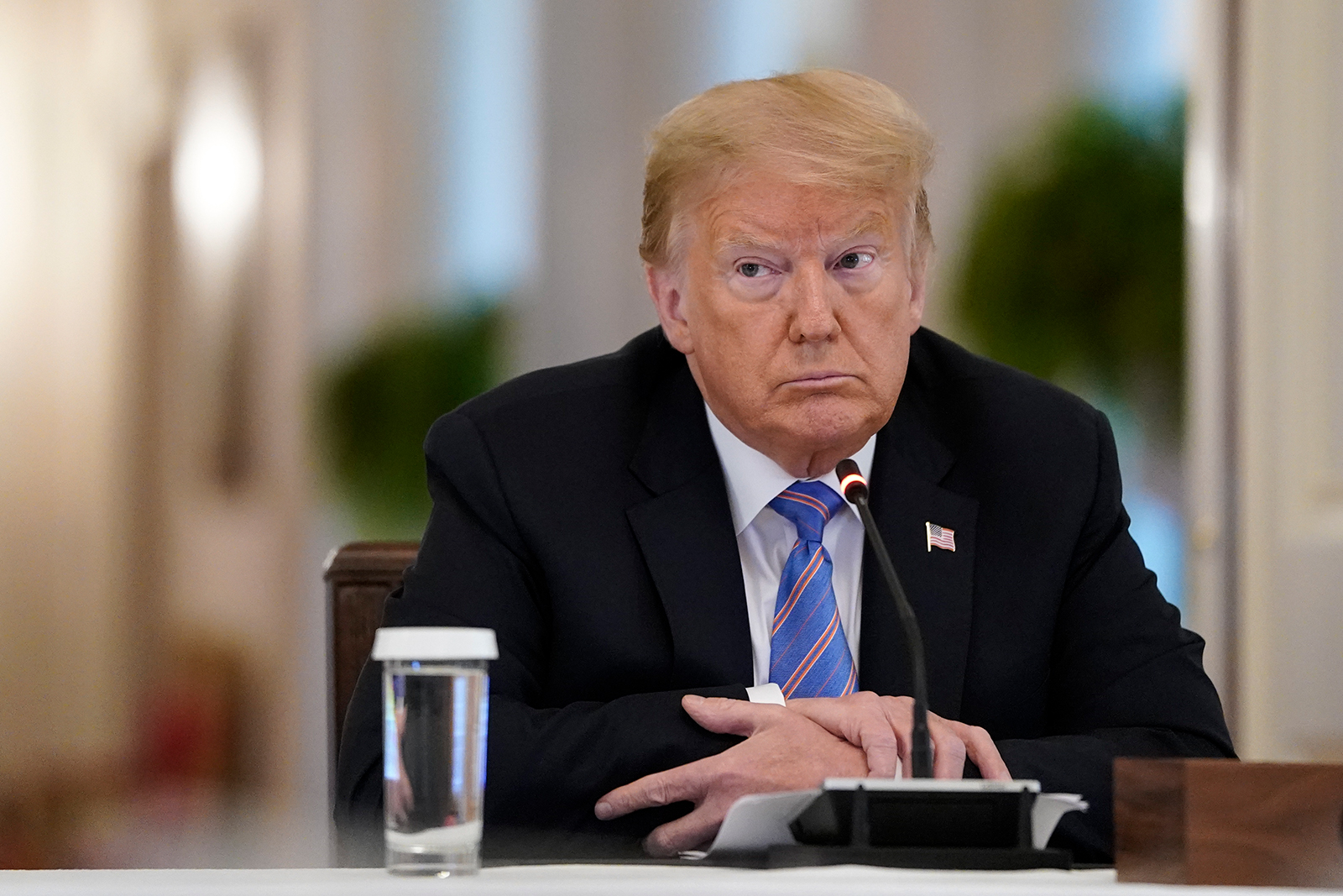 US President Donald Trump participates in a meeting of the American Workforce Policy Advisory Board in the East Room of the White House on June 26, in Washington, DC.