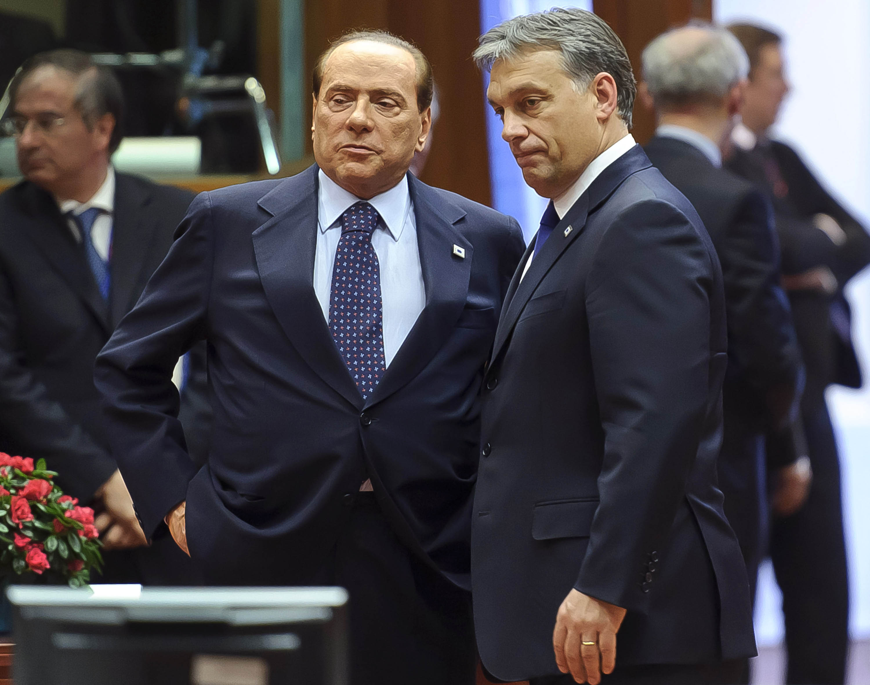 Silvio Berlusconi speaks with Hungarian Prime Minister Viktor Orban during a European Council summit in Brussels, Belgium, in 2011. 
