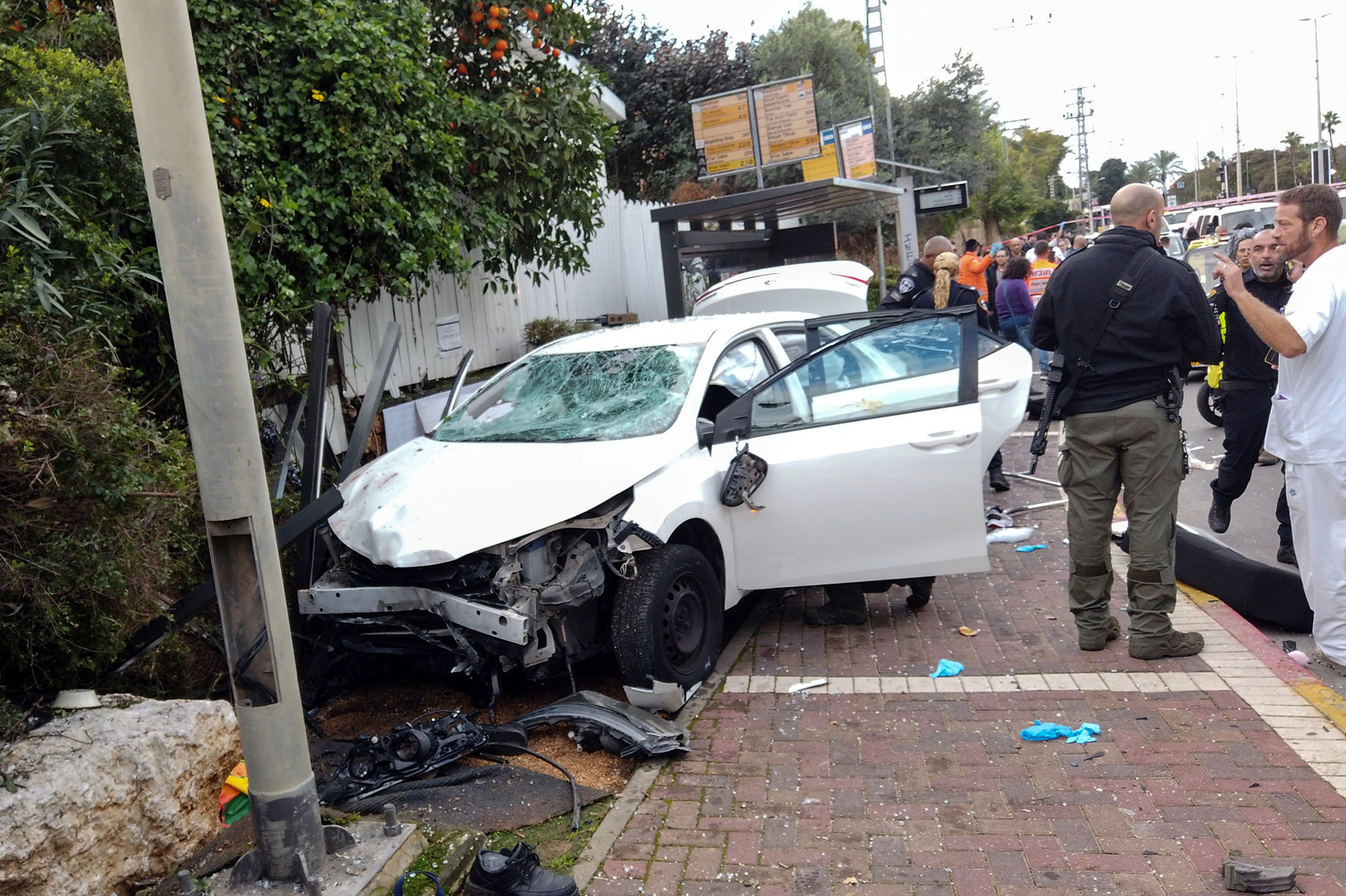 Israeli security officials respond to a suspected ramming attack in Raanana, Israel, on January 15.