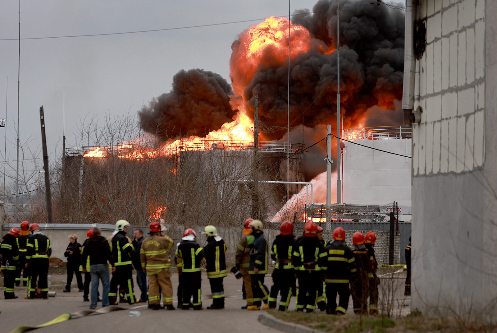 Firefighters battle a blaze at an industrial facility after a Russian military attack in the area on March 26, in Lviv, Ukraine. 