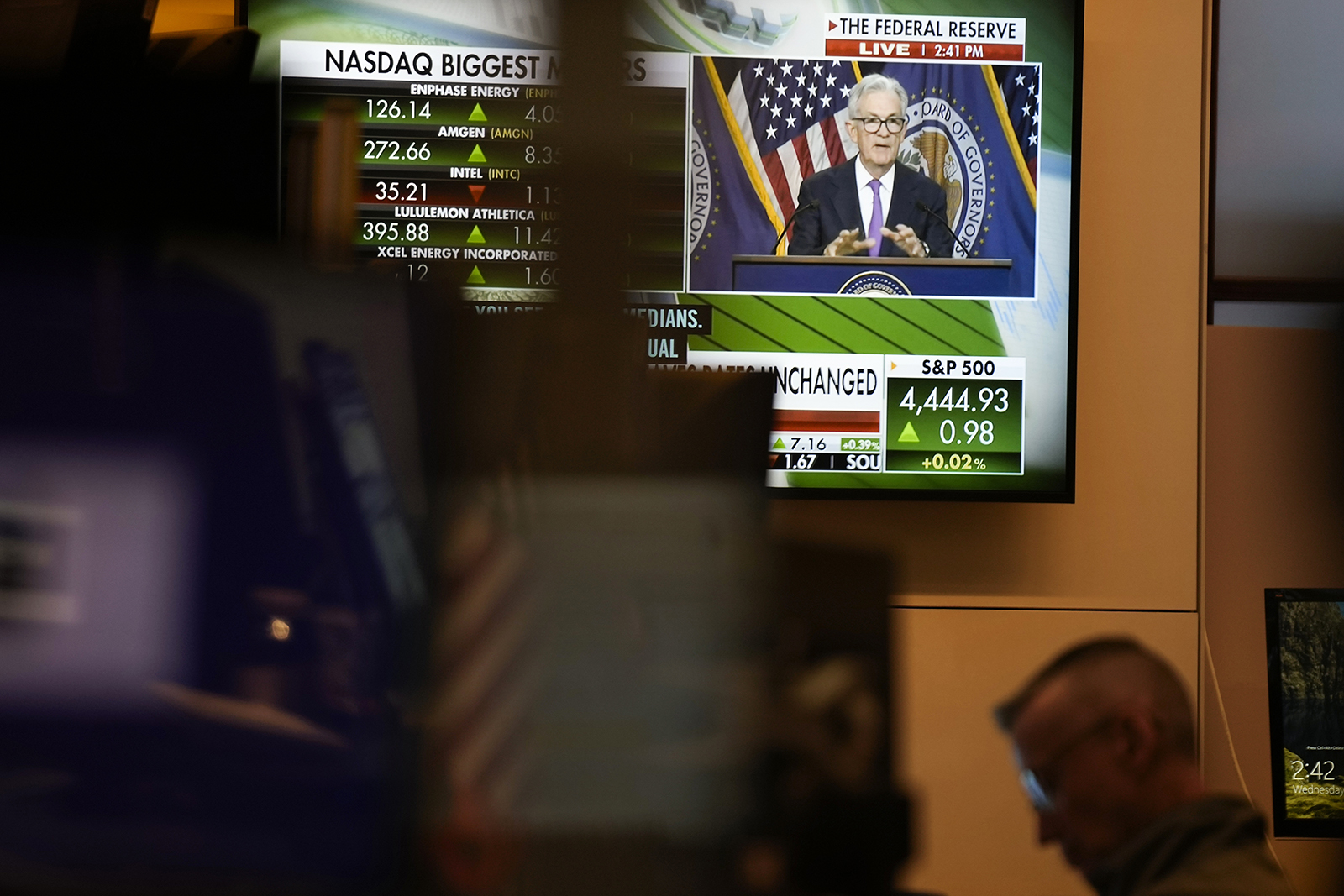 A press conference by Federal Reserve chairman Jerome Powell is displayed at the New York Stock Exchange today.