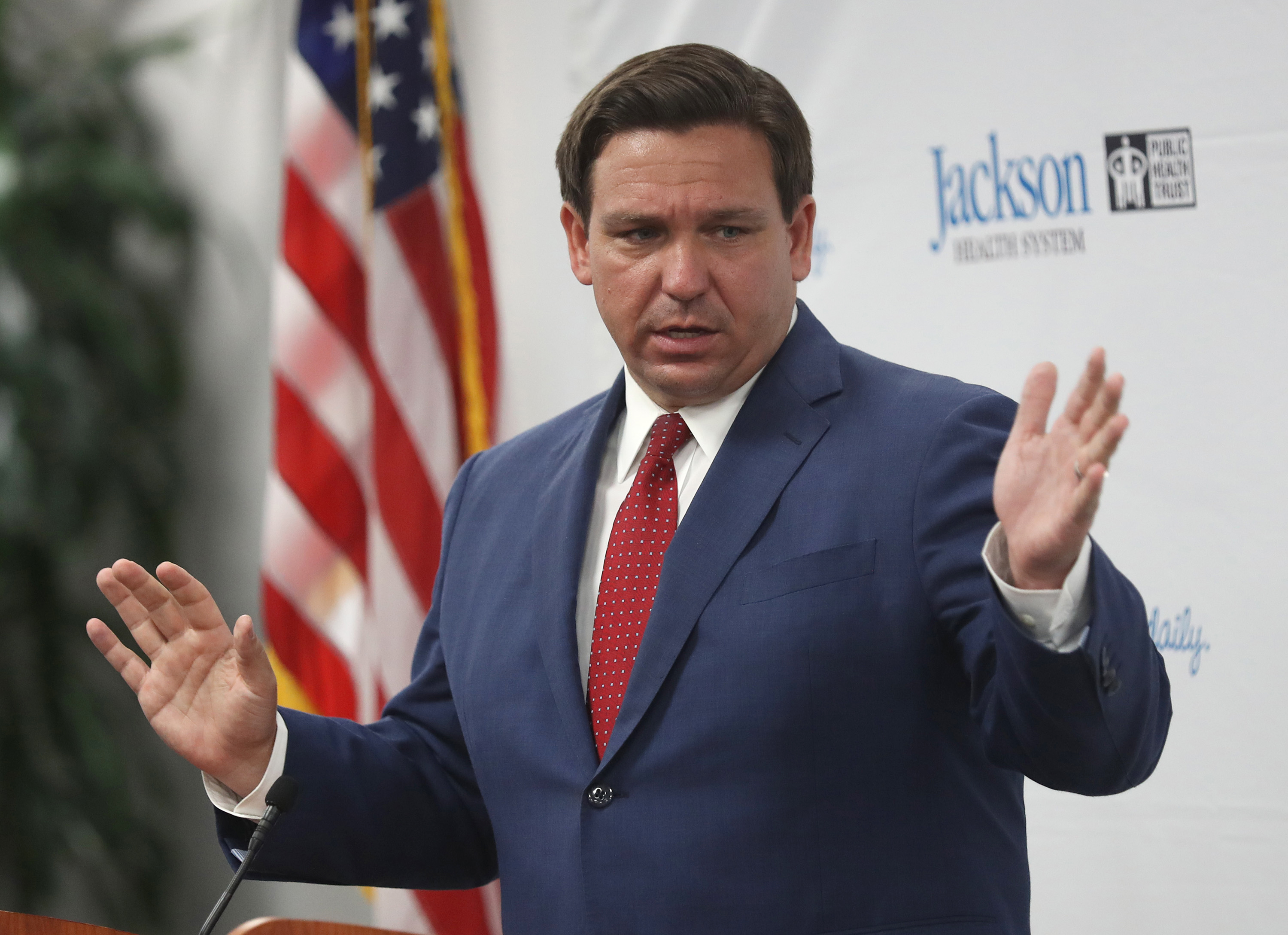 Florida Gov. Ron DeSantis speaks at a new conference on the surge in coronavirus cases in the state held at the Jackson Memorial Hospital on July 13, in Miami.