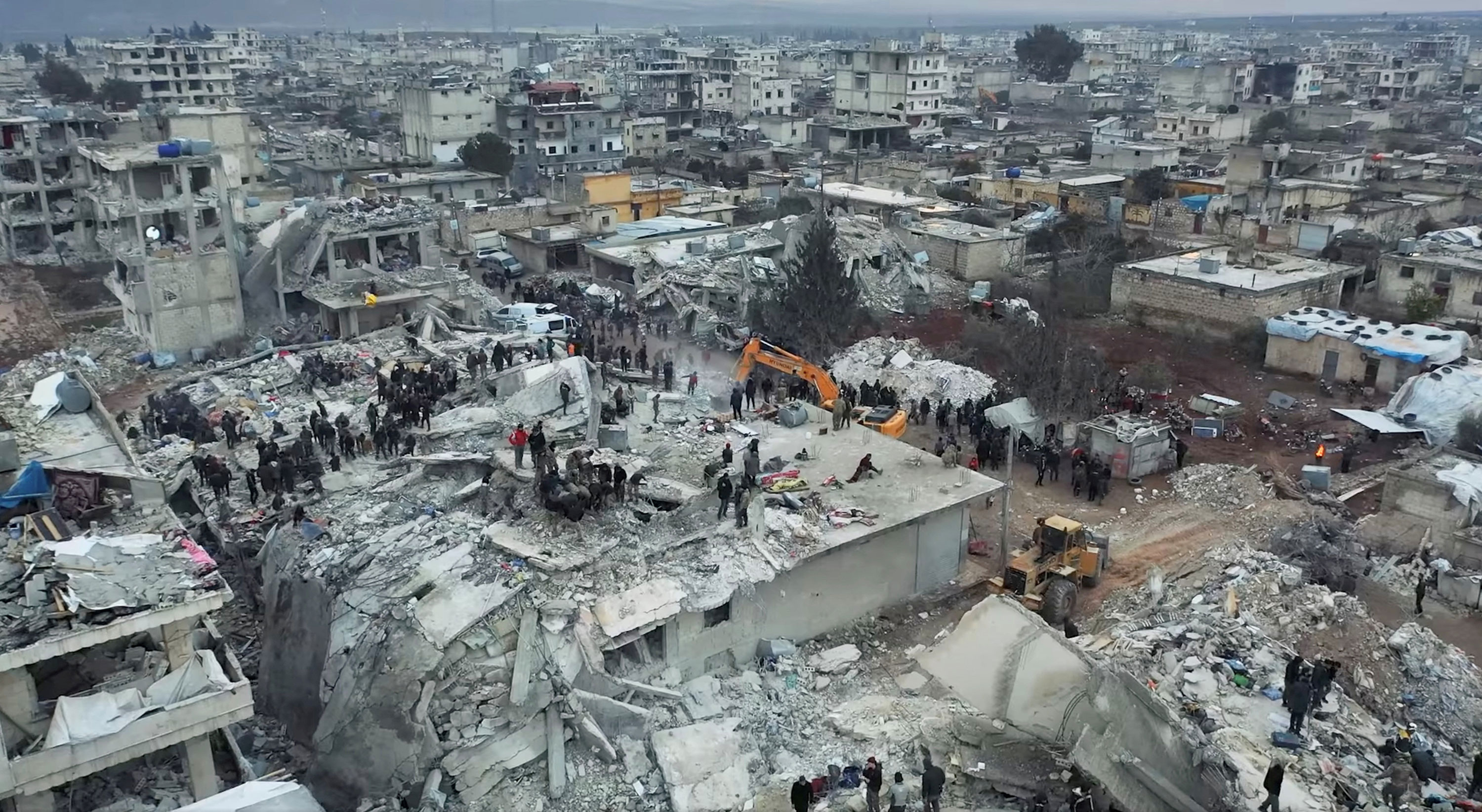 Rescue operations continue in Aleppo, Syria, on Tuesday.