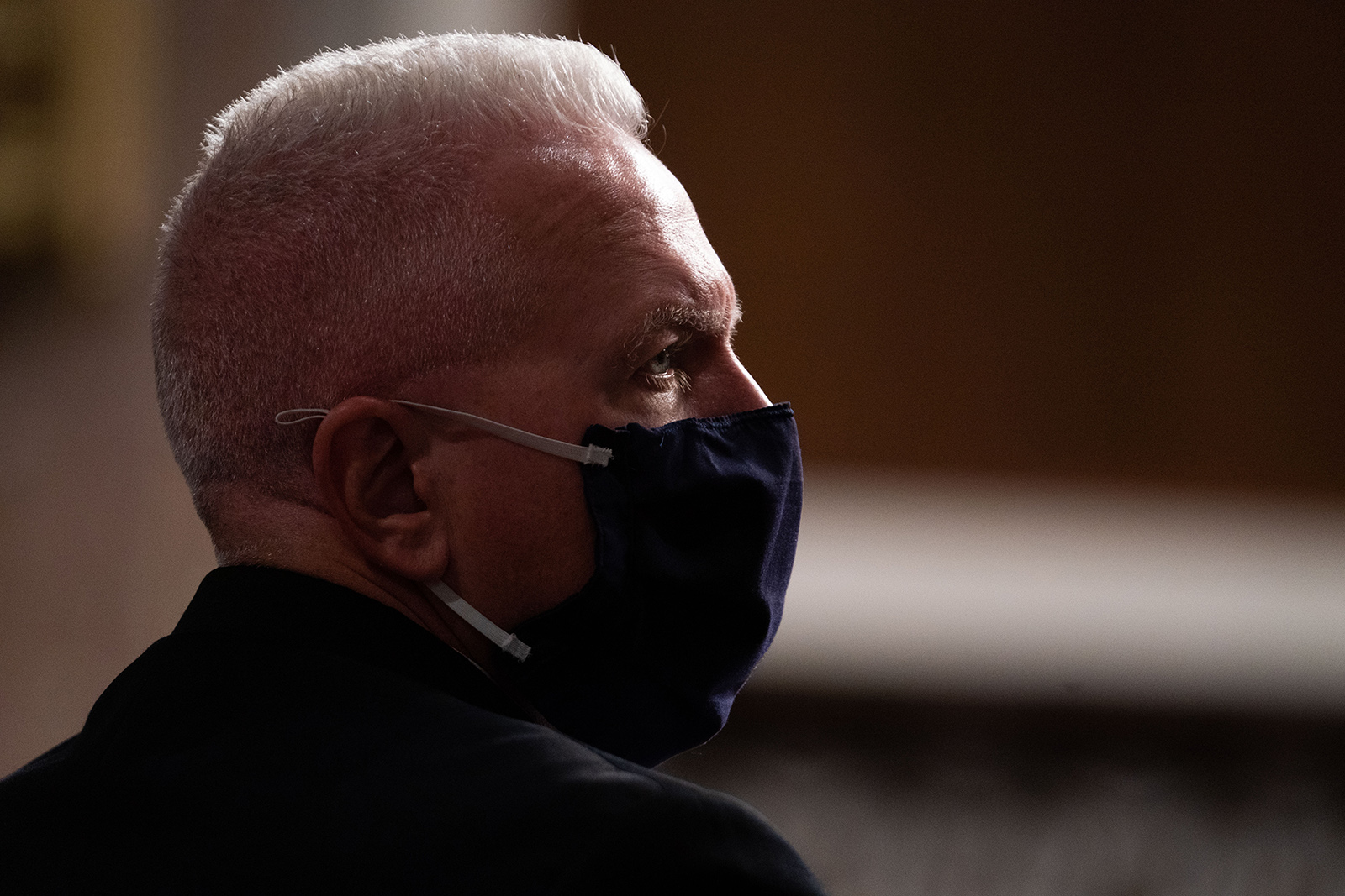 Adm. Brett Giroir listens during a hearing of the Senate Appropriations subcommittee reviewing coronavirus response efforts on Wednesday in Washington.