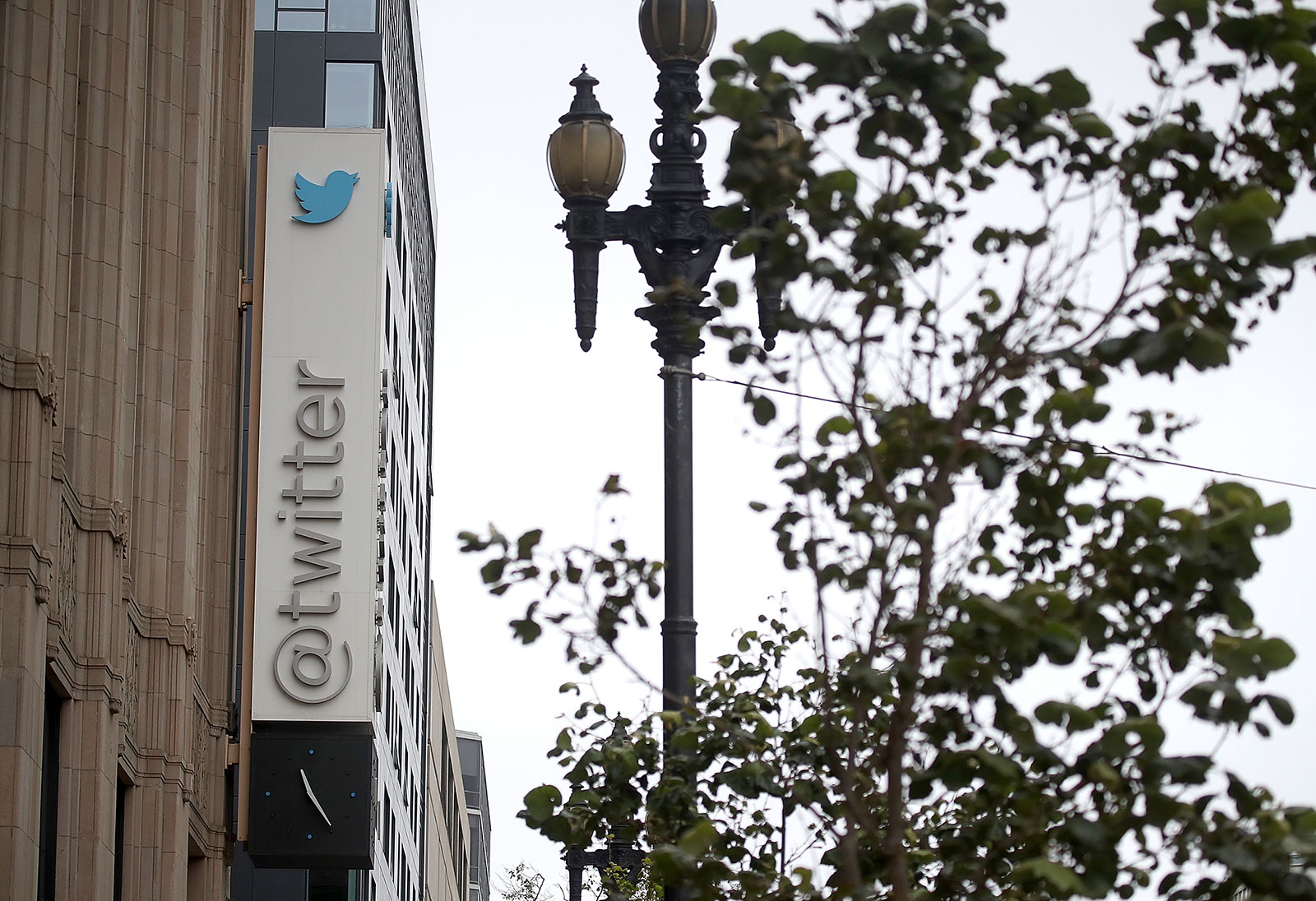 A sign hangs on the exterior of Twitter headquarters in San Francisco, California. Twitter will allow some of its workforce to continue working from home “forever” if they choose.