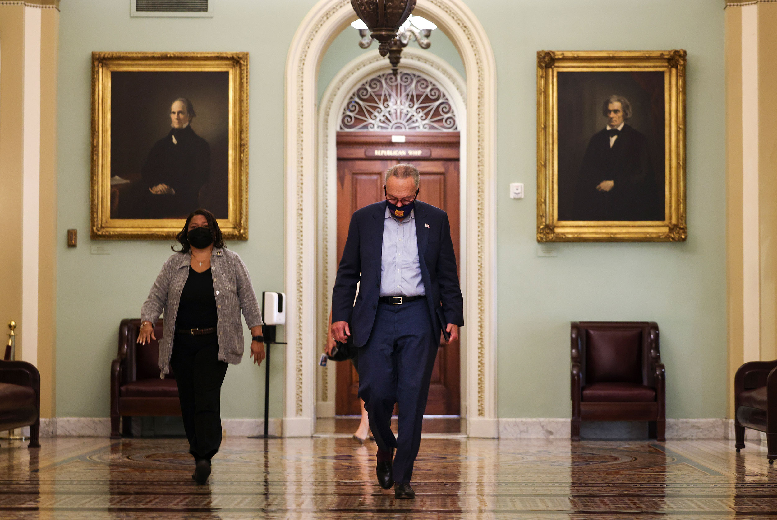 Senate Majority Leader Chuck Schumer walks through the US Capitol on Wednesday, September 29.