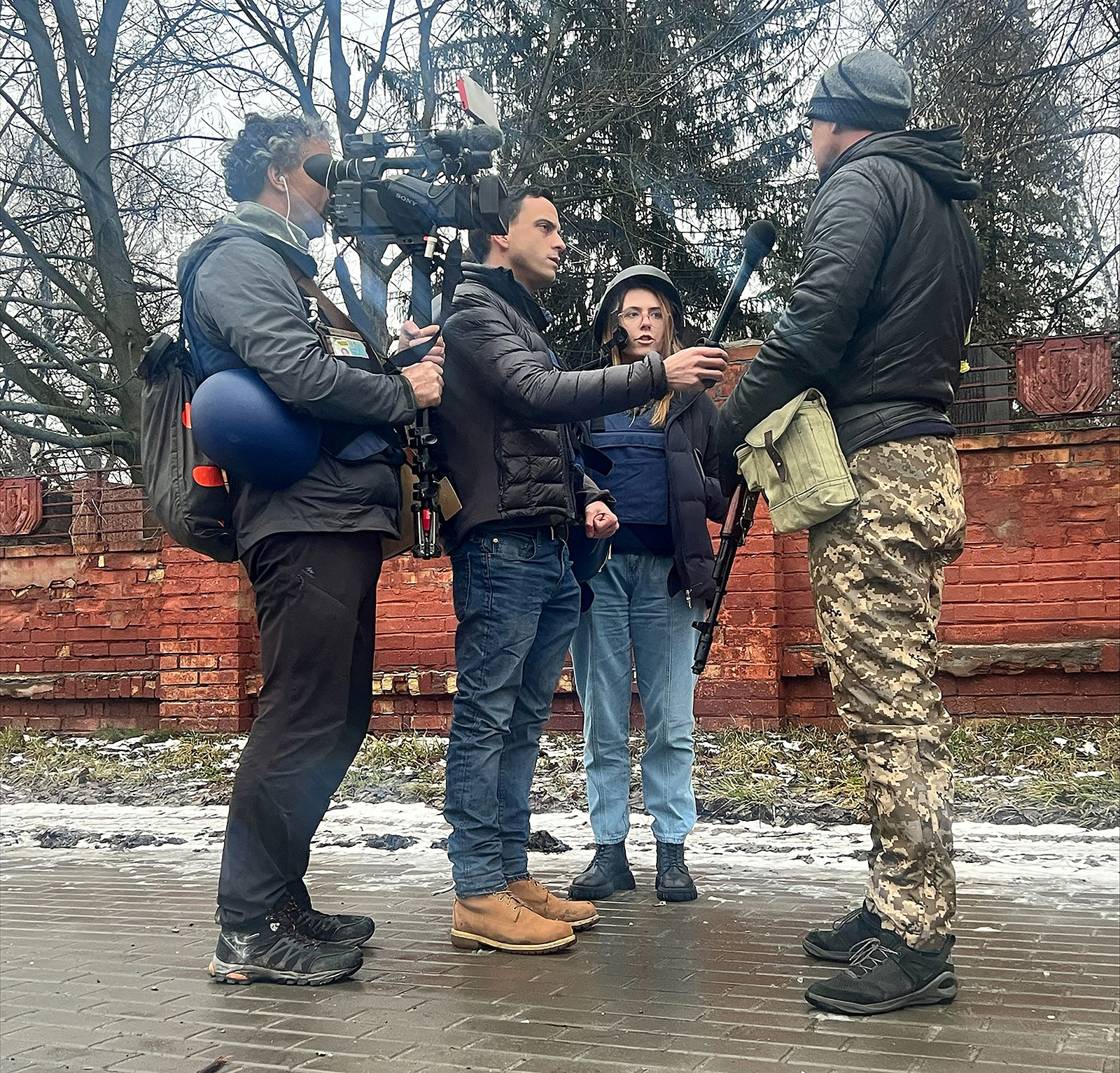 Ukrainian journalist Oleksandra Kuvshynova works with Fox journalist Trey Yingst and cameraperson Pierre Zakrzewski in this undated photo taken in Ukraine.