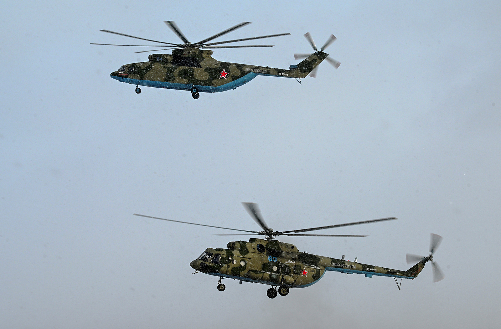 Russian Mi-8 and Mi-26 military helicopters are seen during flight testing conducted by the Russian Air Force of the Southern Military District at an aerodrome in the Rostov region, Russia on January 19, 2022.