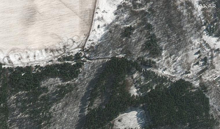According to Maxar, the satellite images show that some elements of the convoy have "repositioned" into forests and treelined areas near Lubyanka, Ukraine.