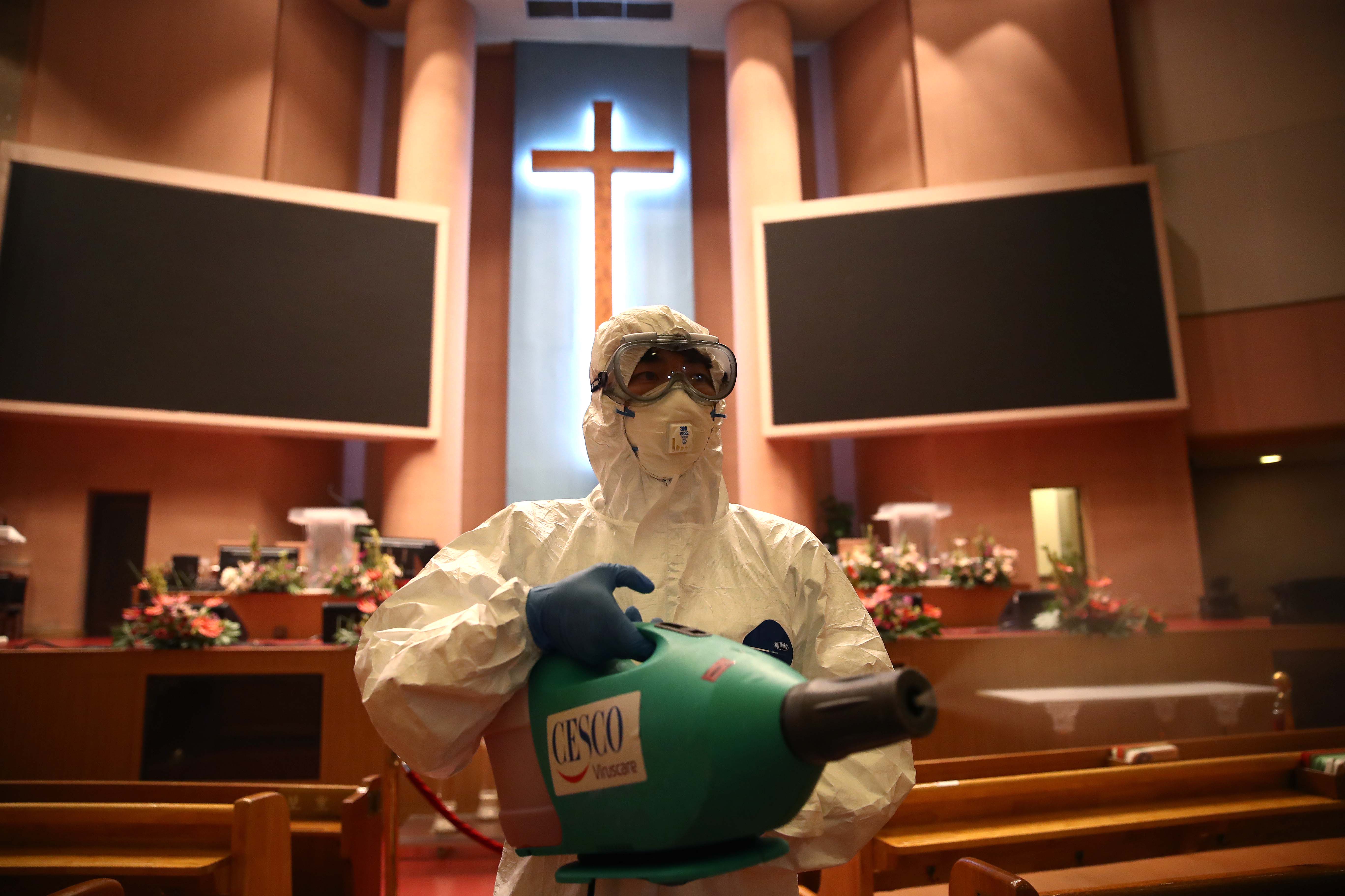 A worker disinfects a Yoido Full Gospel Church in Seoul, South Korea, amid concerns over the spread of coronavirus, on August 21.