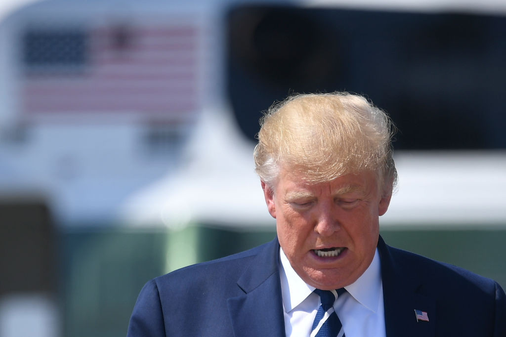 Trump walks from Marine One to board Air Force One before departing from Andrews Air Force Base, Maryland on July 19, 2019.