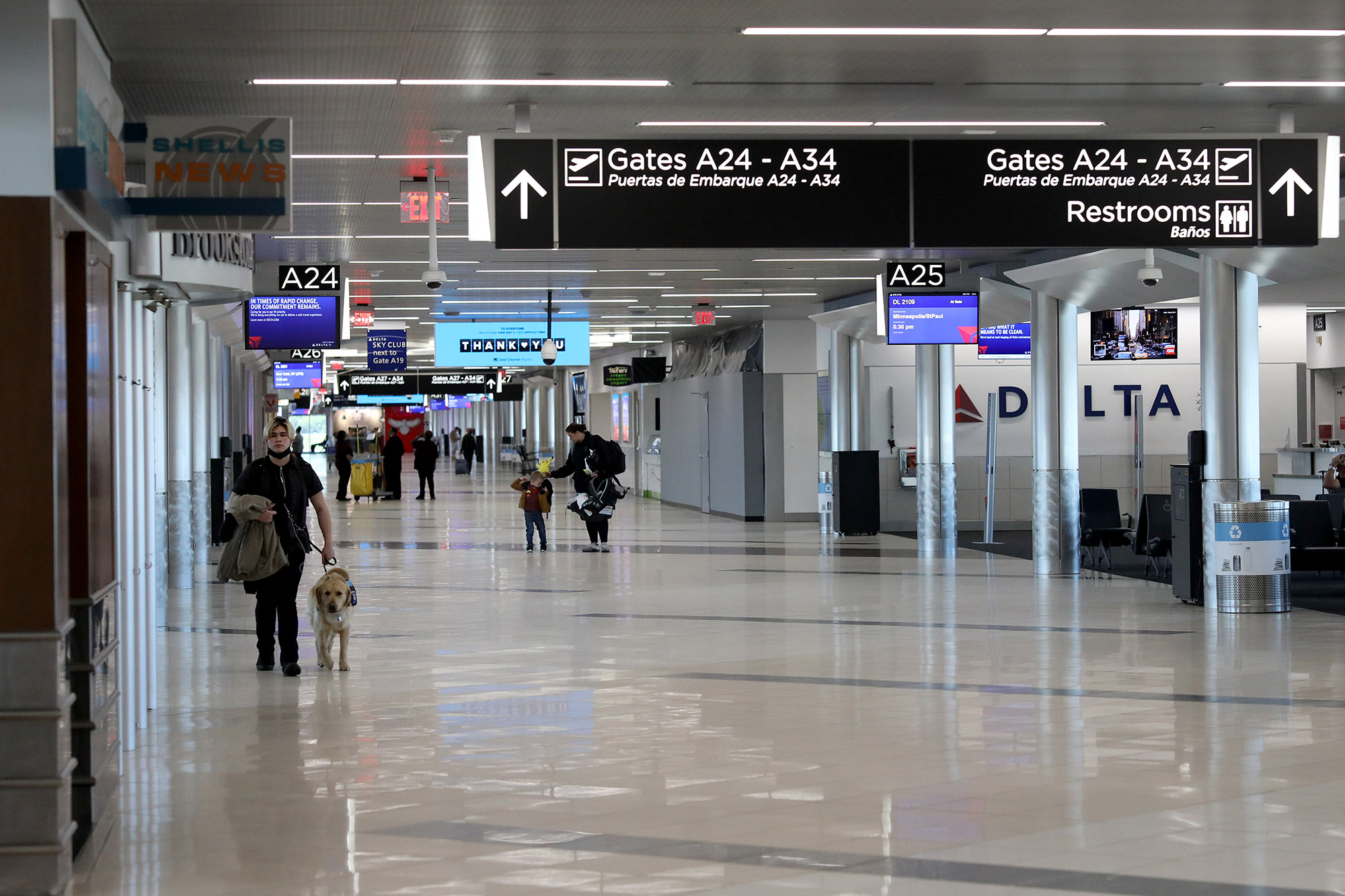 Travelers walk through terminal A at Hartsfield-Jackson Atlanta International Airport on April 20, in Atlanta, Georgia. 