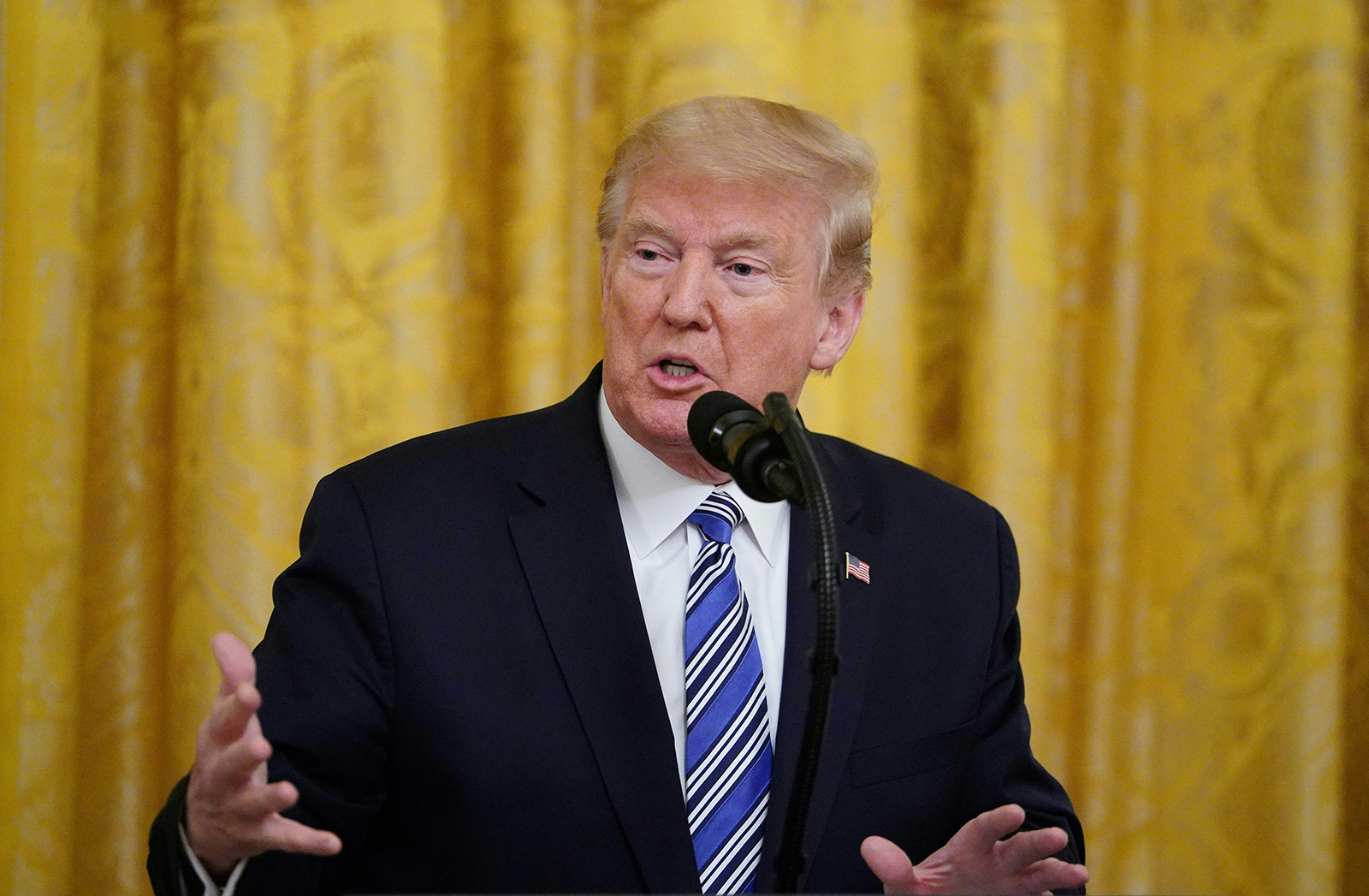President Donald Trump speaks in the East Room of the White House in Washington, DC, on April 28.