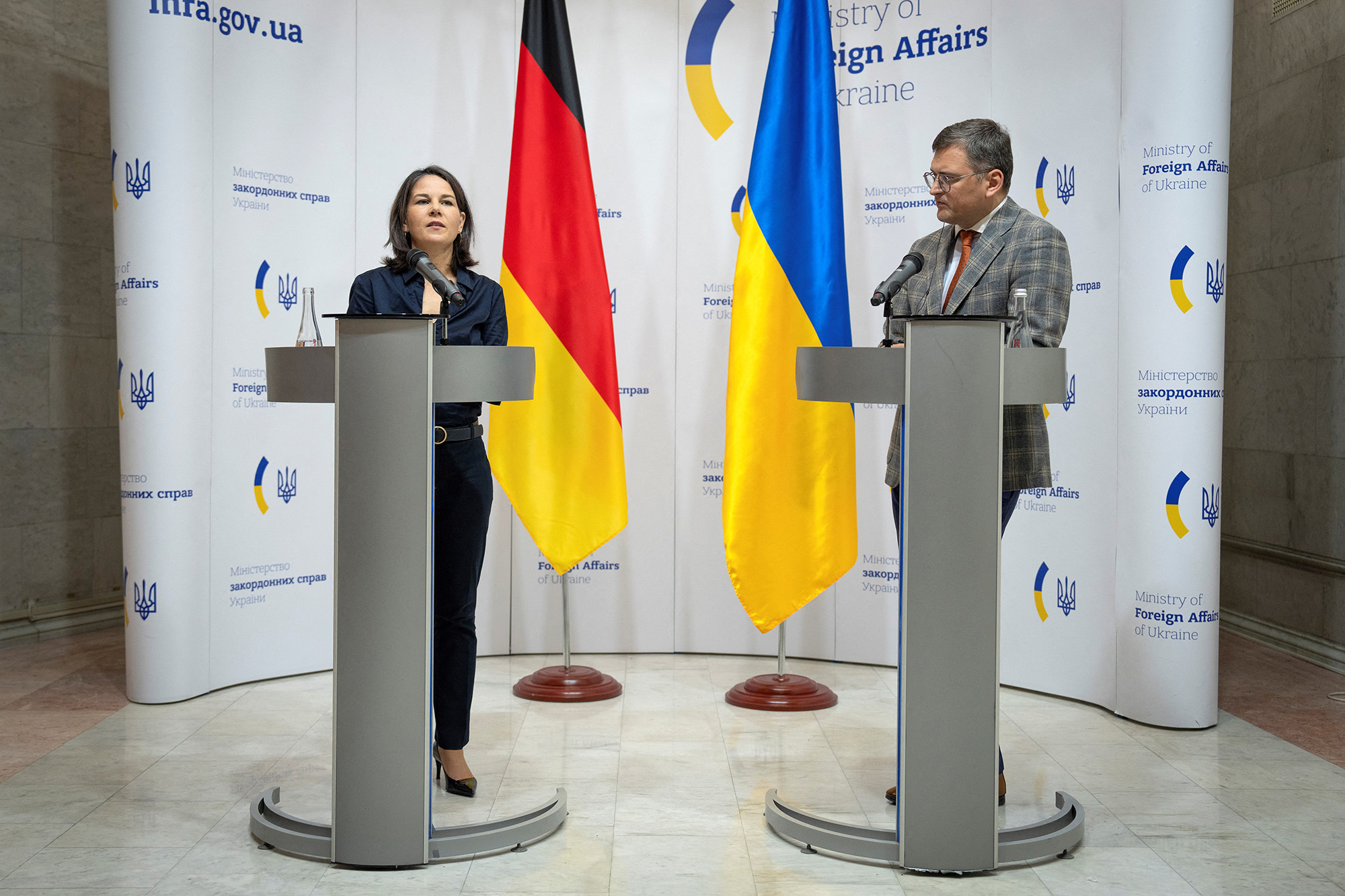 German Foreign Minister Annalena Baerbock, left, and Ukrainian Foreign Minister Dmytro Kuleba attend a joint press conference following their talks in Kyiv, Ukraine, on September 11.