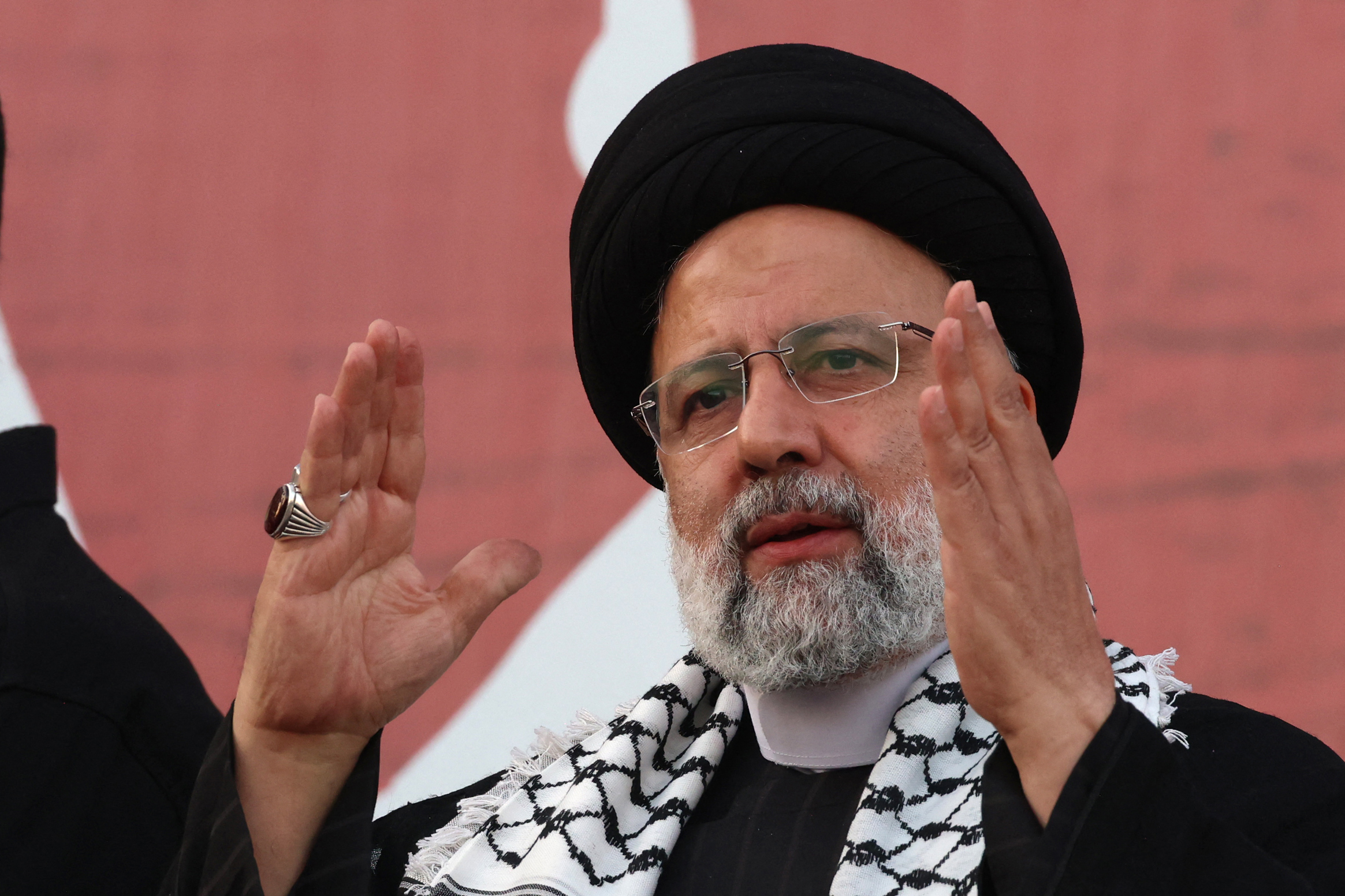 Iranian President Ebrahim Raisi speaks to the crowds gathered to protest in Tehran in support of Palestinians in Gaza on October 18.