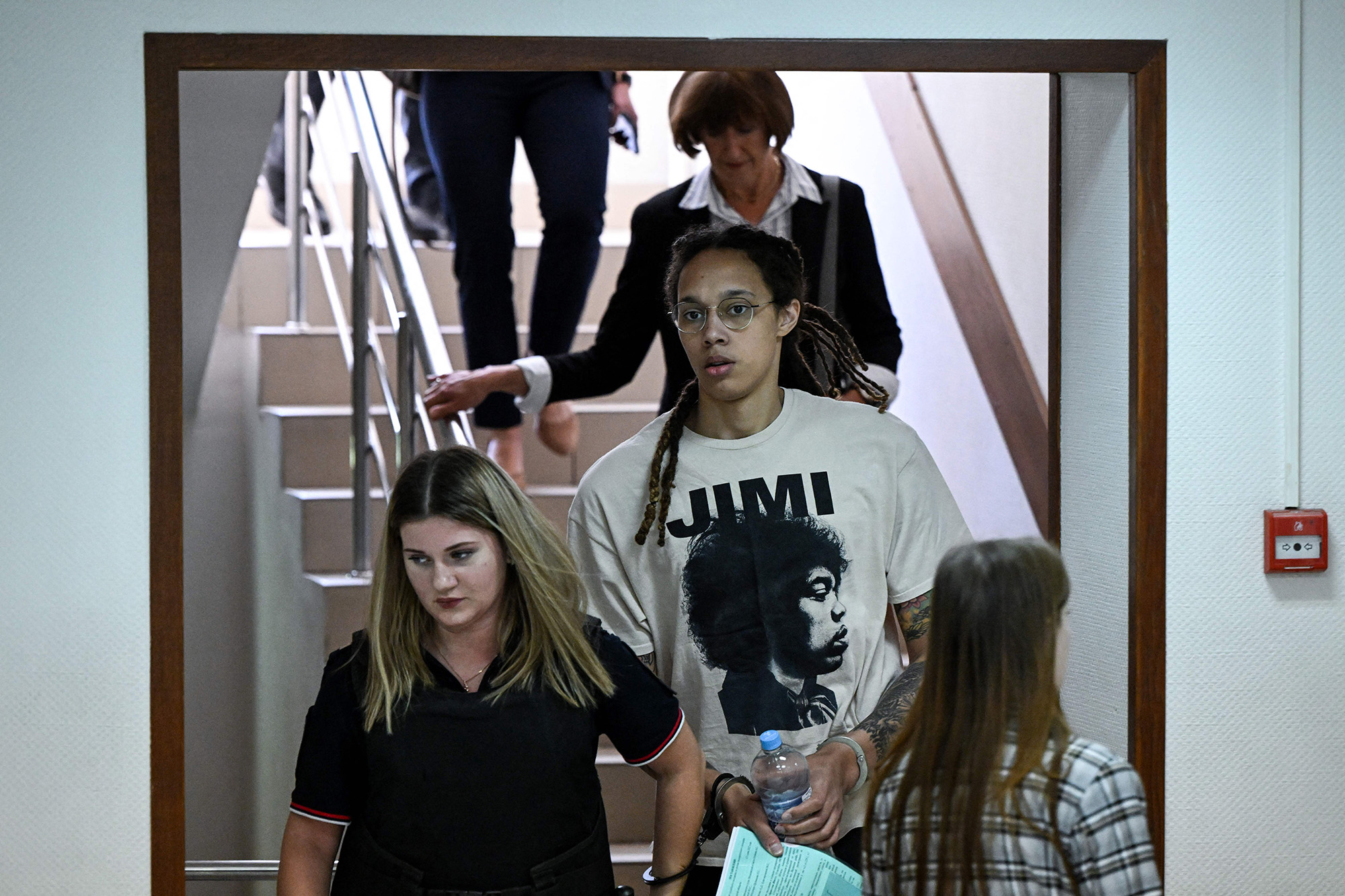 US WNBA basketball superstar Brittney Griner, center, arrives to a hearing at the Khimki Court, outside Moscow, Russia, on July 1.