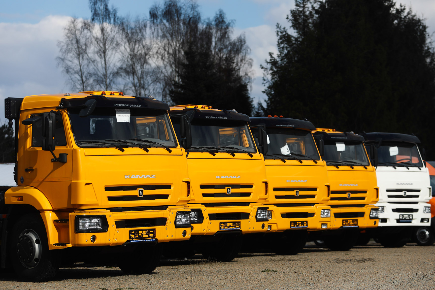 A line of Kamaz trucks stand outside a showroom in Libertow, Poland on April 4.