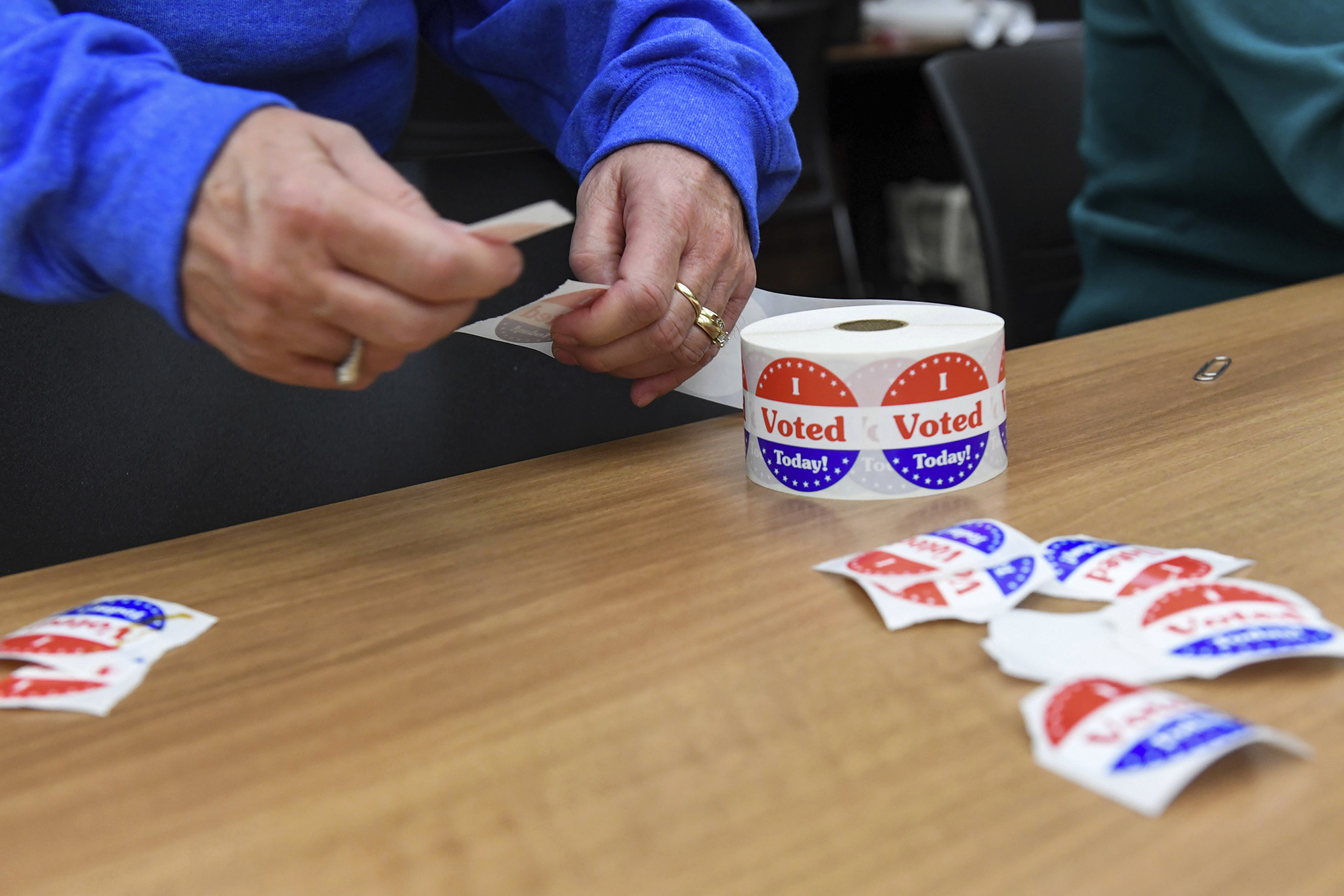 "I Voted" stickers are separated for voters on Tuesday morning, November 8, at the downtown Siouxland Public Library branch in Sioux Falls, S.D.
