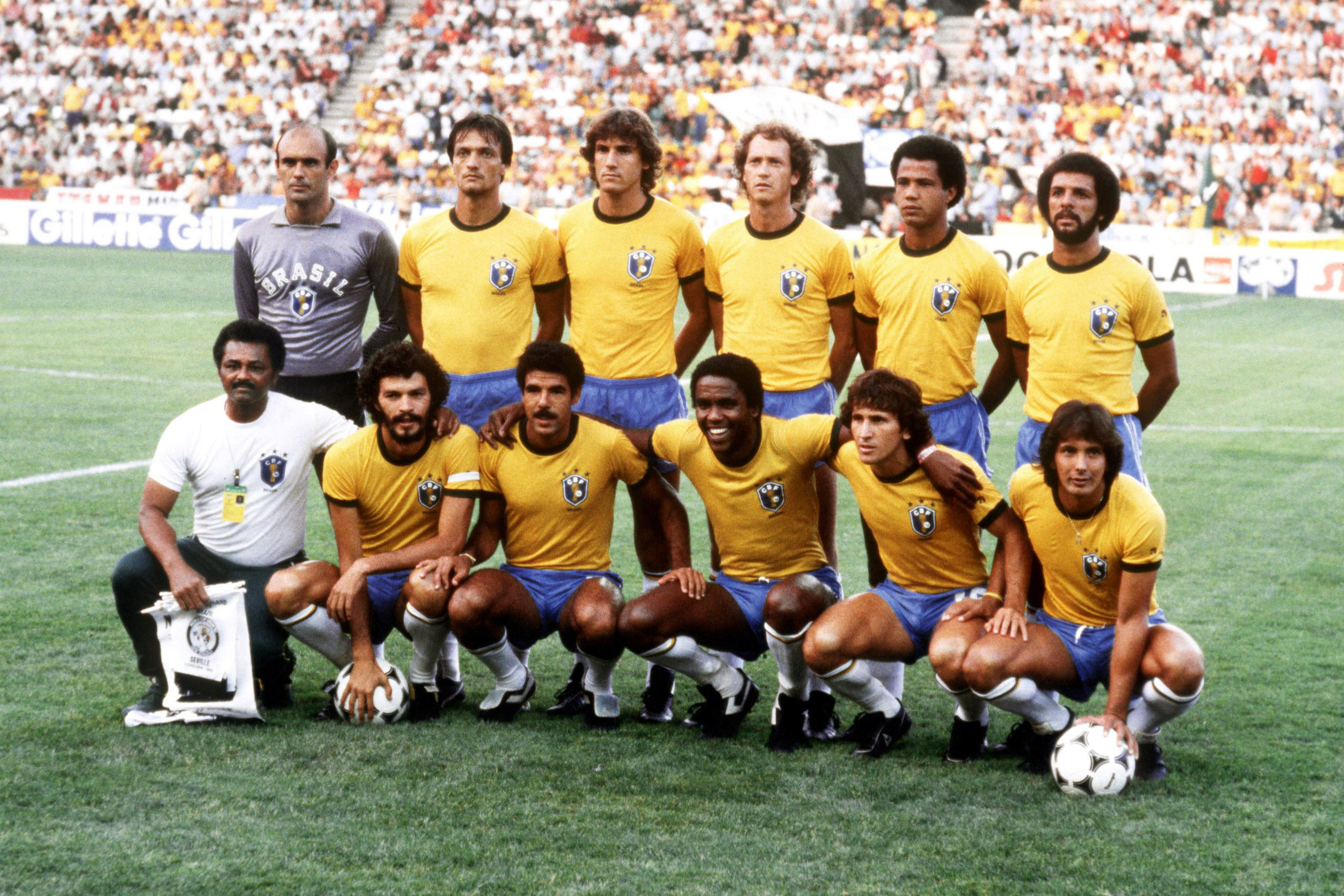 Brazil team group. Back, left to right: Waldir Perez, Leandro, Oscar, Falcao, Luizinho, Junior. Front, left to right: Trainer, Socrates, Cerezo, Serginho, Zico, Eder.