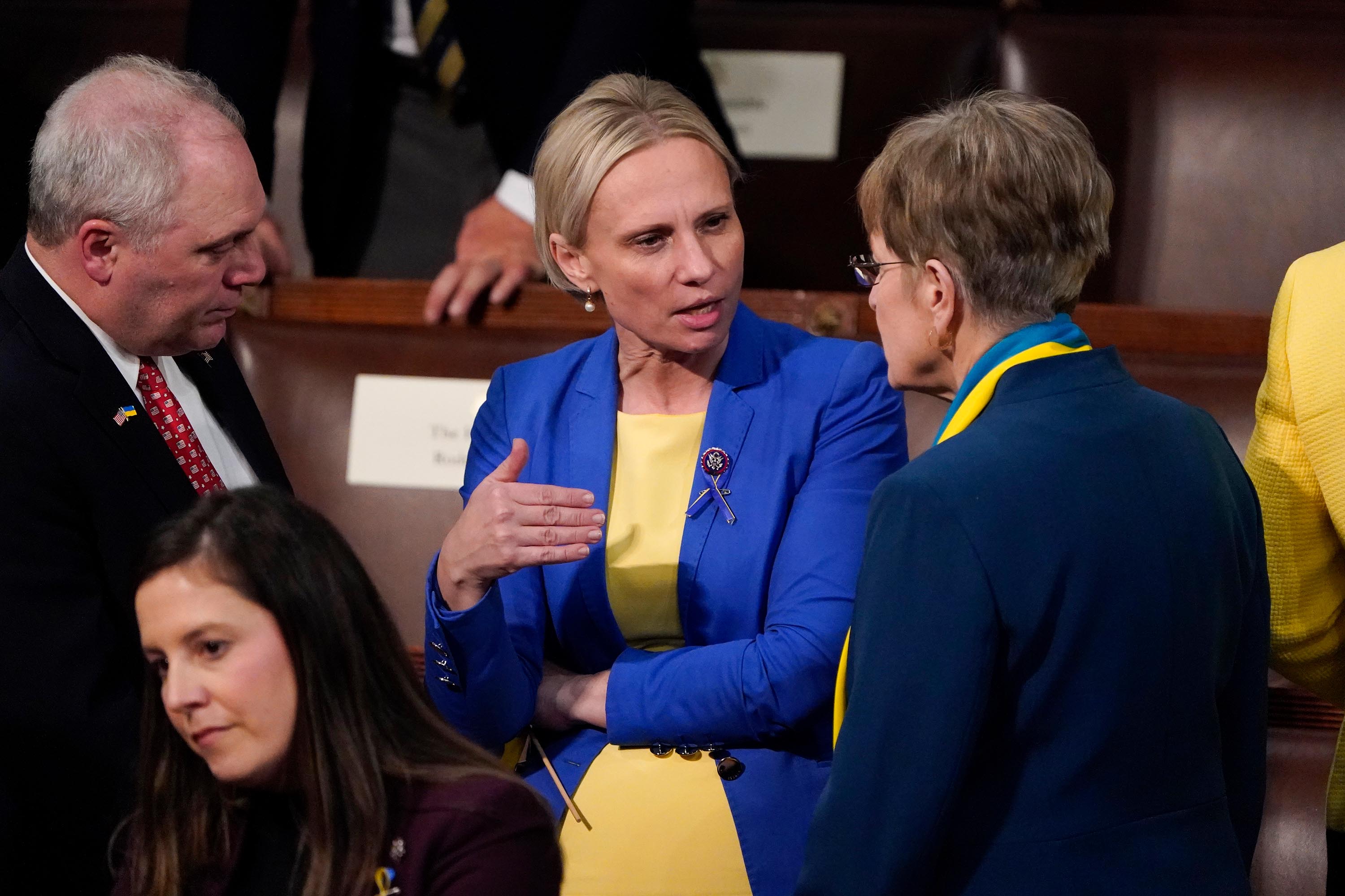Rep. Steve Scalise, left, and Rep. Marcy Kaptur, right, talk with Ukrainian-American Rep. Victoria Spartz, before President Joe Biden delivers his first State of the Union address, Tuesday, March 1. 