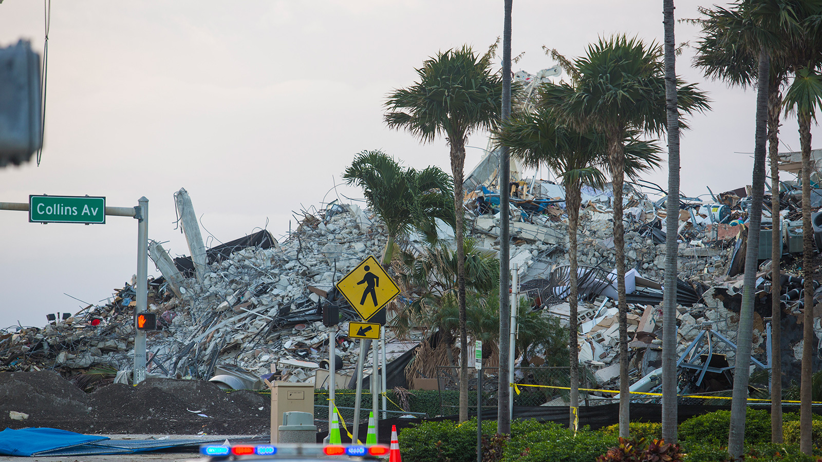 A pile of debris remains the morning after the partially collapsed 12-story Champlain Towers South condo was taken down with a controlled demolition on July 5 in Surfside, Florida. 