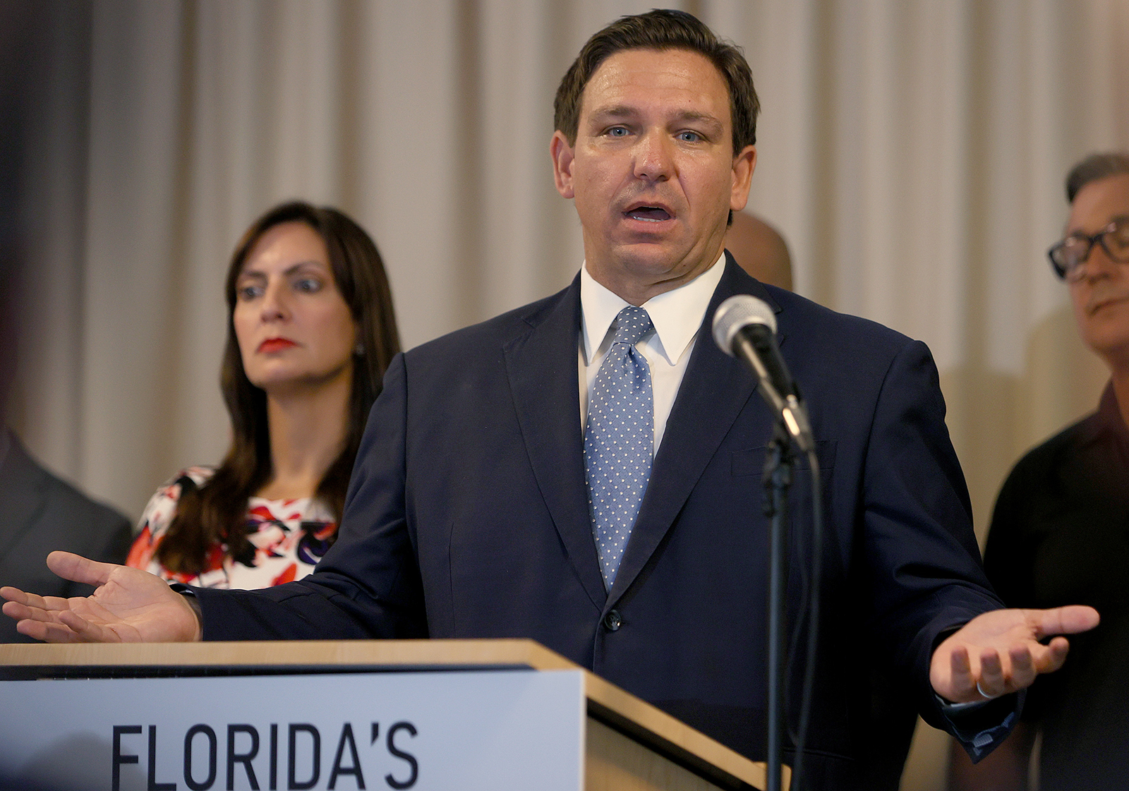 Florida Gov. Ron DeSantis speaks during an event to give out bonuses to first responders held at the Grand Beach Hotel Surfside on August 10 in Surfside, Florida. 