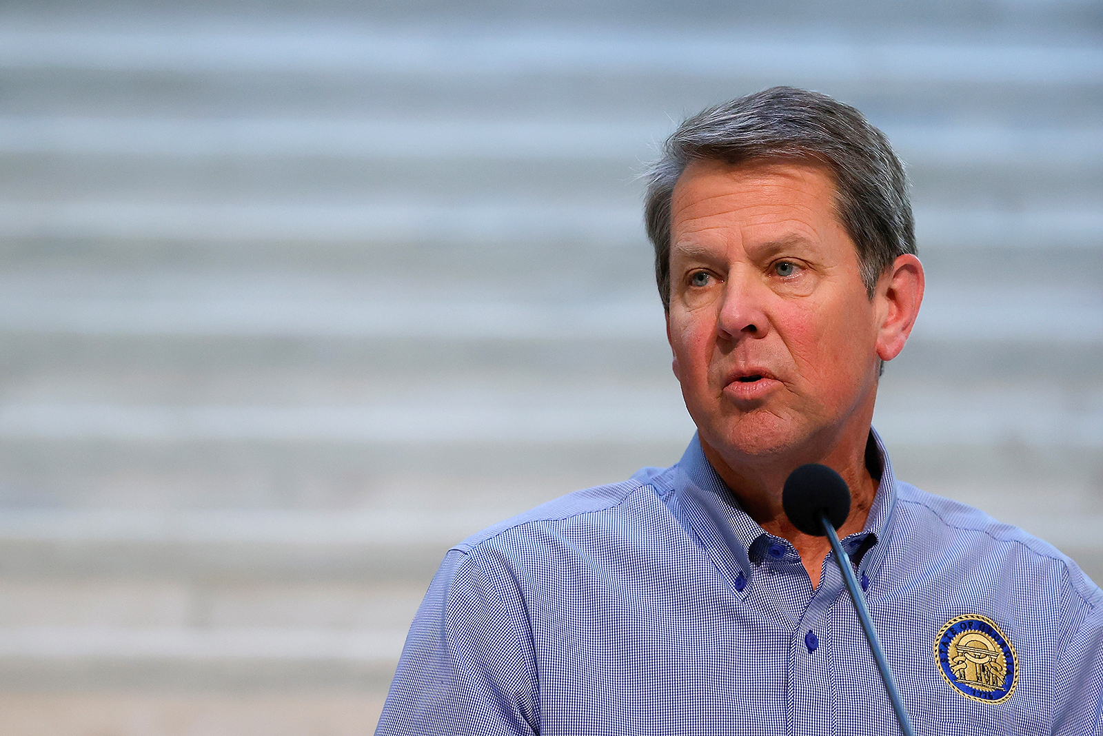 Gov. Brian Kemp speaks to the media during a press conference at the Georgia State Capitol in Atlanta on April 27.