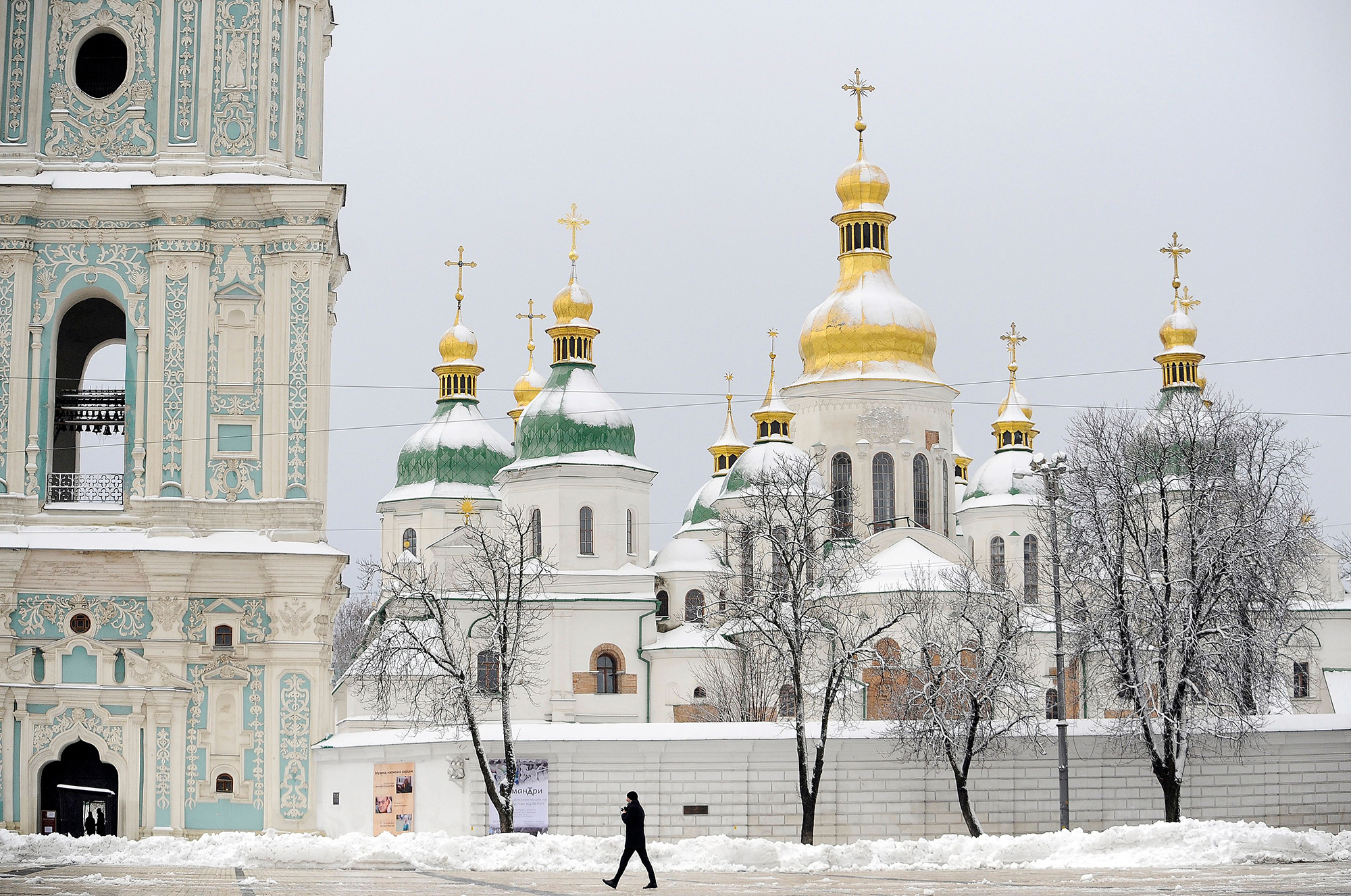 Snow covers the bell tower and the domes of Saint Sophia Cathedral, Kyiv, Ukraine, on November 19.