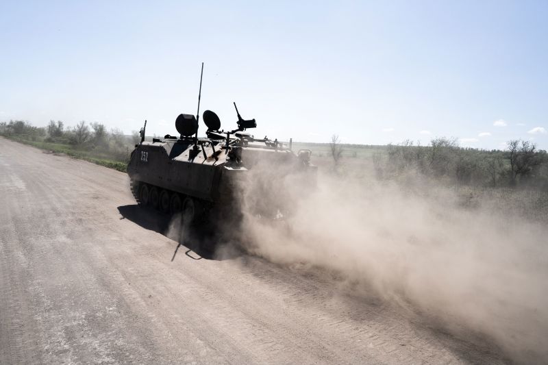 A Ukrainian armored infantry carrier travels along a road near Bakhmut, Ukraine, on Wednesday.