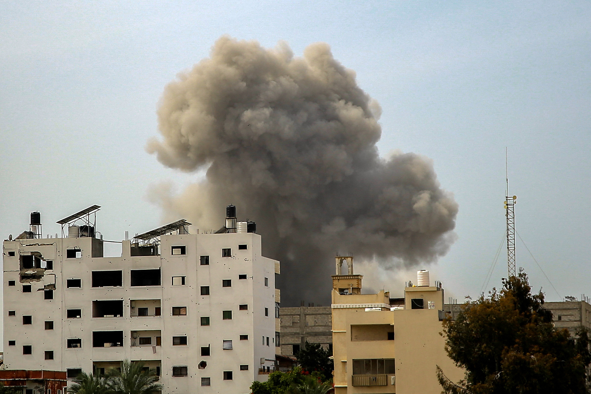 Smoke rises above buildings during an Israeli strike in the vicinity of Al-Shifa hospital in Gaza City, on March 28. 