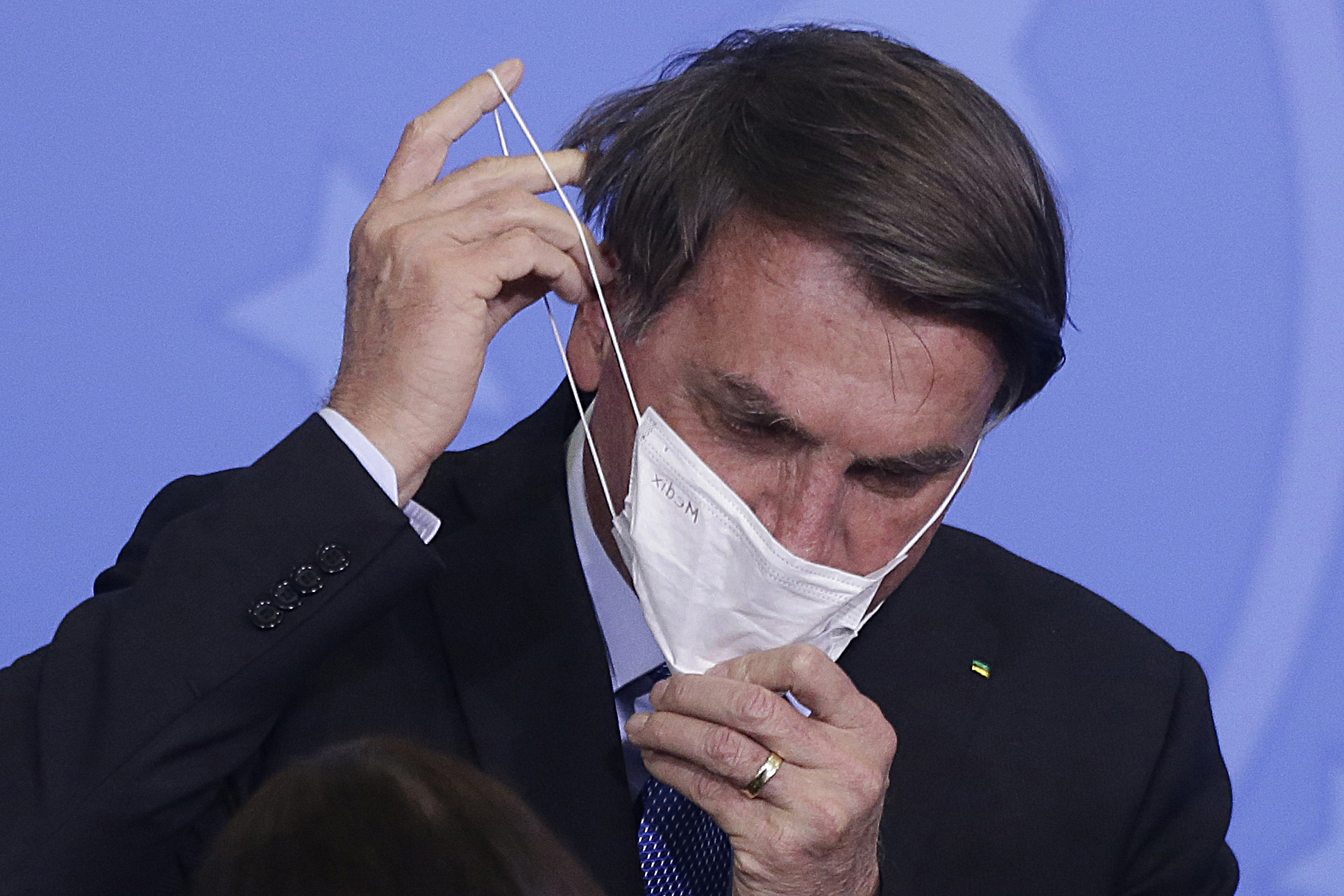 Brazilian President Jair Bolsonaro during the ceremony to extend emergency aid to informal workers, at the Planalto Palace, in Brasilia, Brazil, on June 30, 2020. 