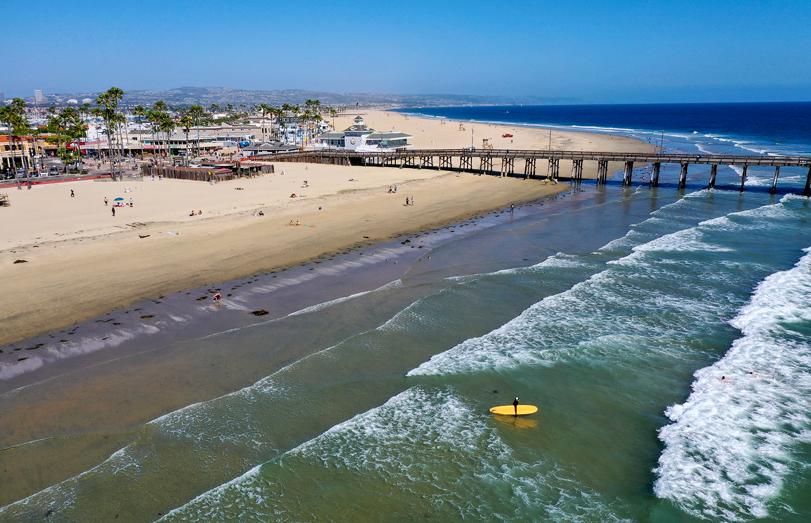An aerial view of beach-goers at Newport Beach on Monday, May 4.