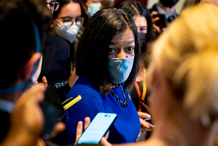 Rep. Pramila Jayapal speaks to reporters as she walks out of a House Democratic Progressive Caucus meeting on Capitol Hill, Thursday, October 28.