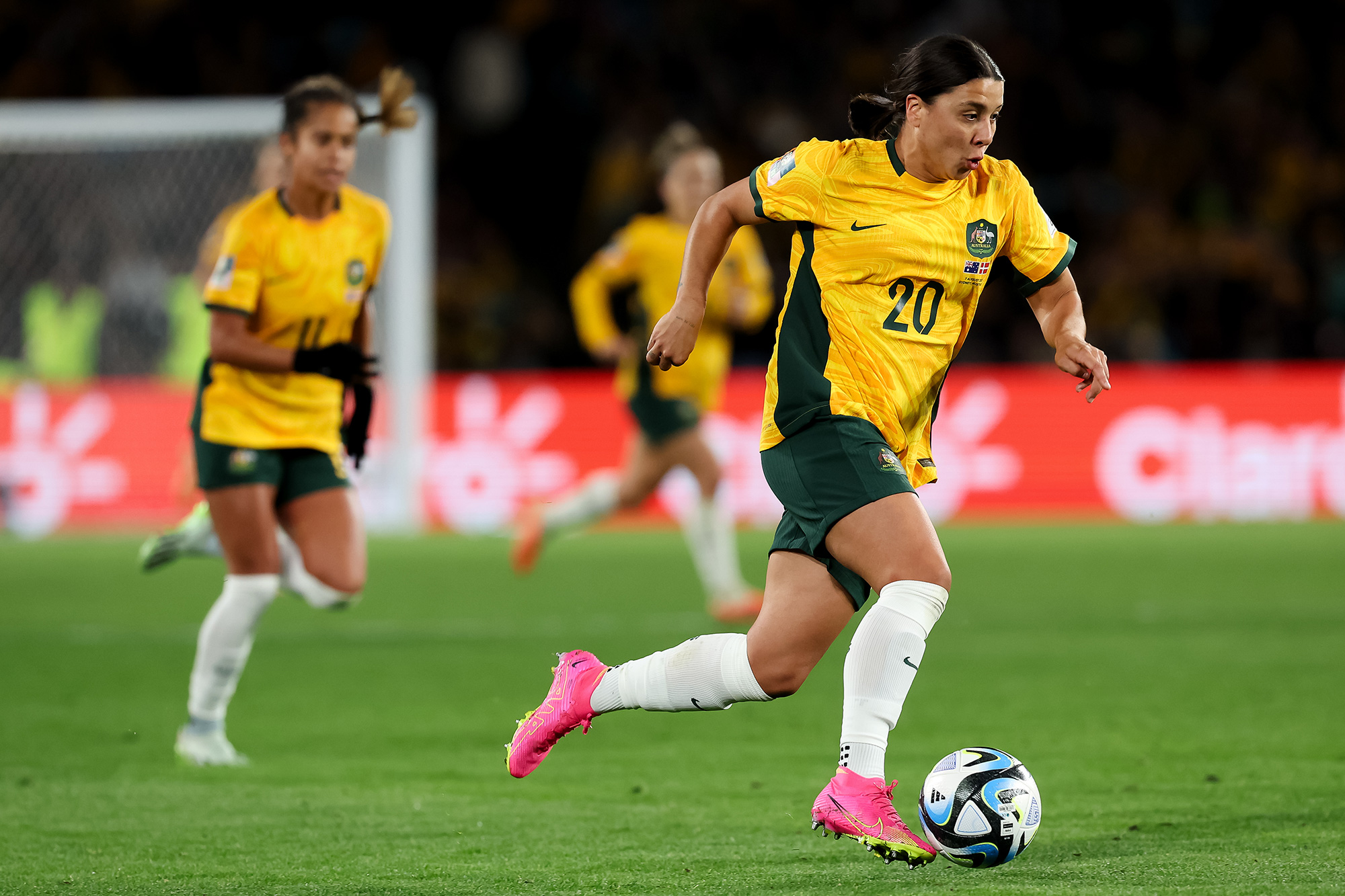 Sam Kerr runs with the ball during the match against Denmark. 