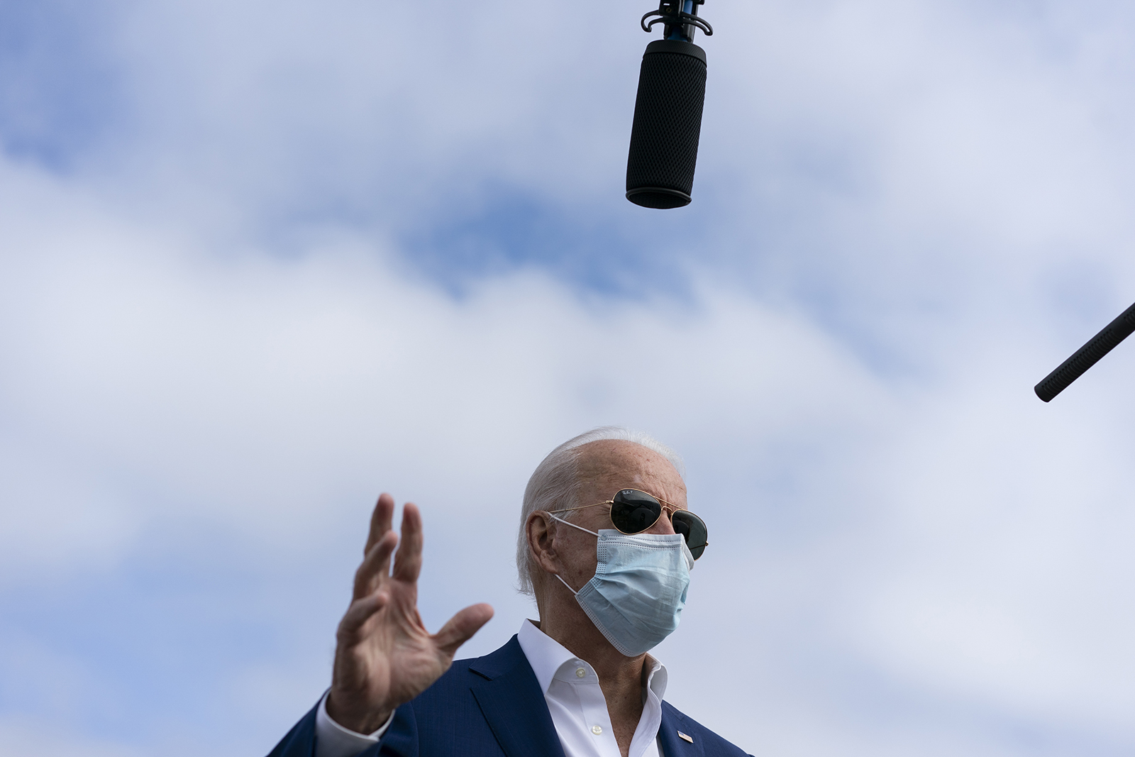 Democratic presidential candidate former Vice President Joe Biden speaks to media before boarding his campaign plane at New Castle Airport, in New Castle, Delaware, on October 13. 