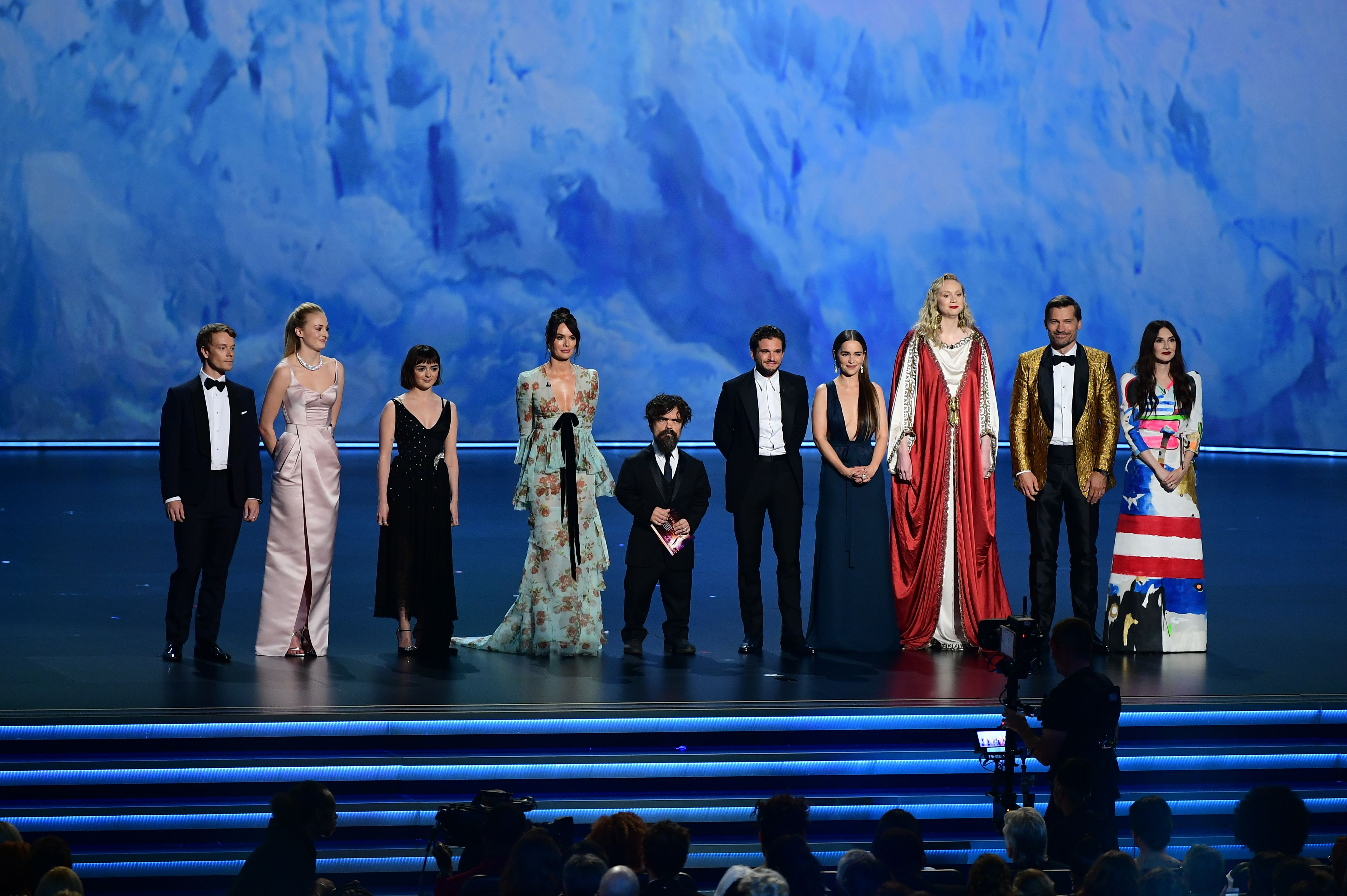 Cast and crew of Game of Thrones, winners of the award for Outstanding  Writing for a Drama Series, appear backstage during the 70th annual  Primetime Emmy Awards at the Microsoft Theater in