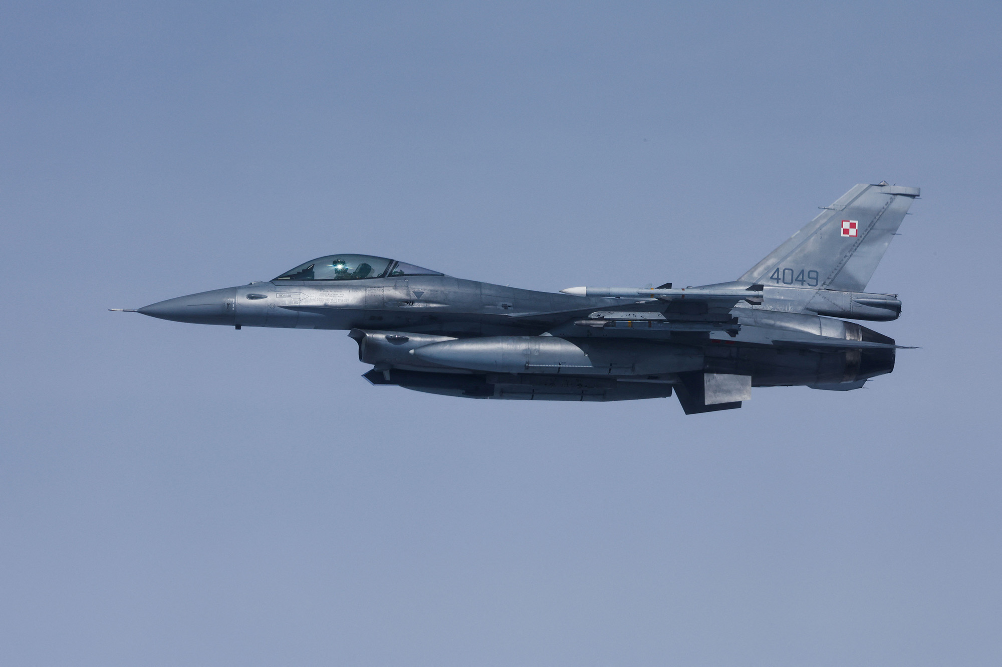 A Polish Air Force fighter jet F16 flies in the airspace of Poland as part of NATO's enhanced Air Policing (eAP) to secure the skies over Baltic allies, March 29.