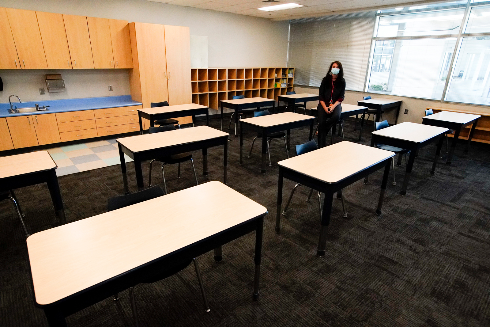 Principal Susan Stevens talks to the media during a demonstration of a socially-distanced classroom at A.J. Whittenberg Elementary School of Engineering Monday, July 20, in Greenville, South Carolina.