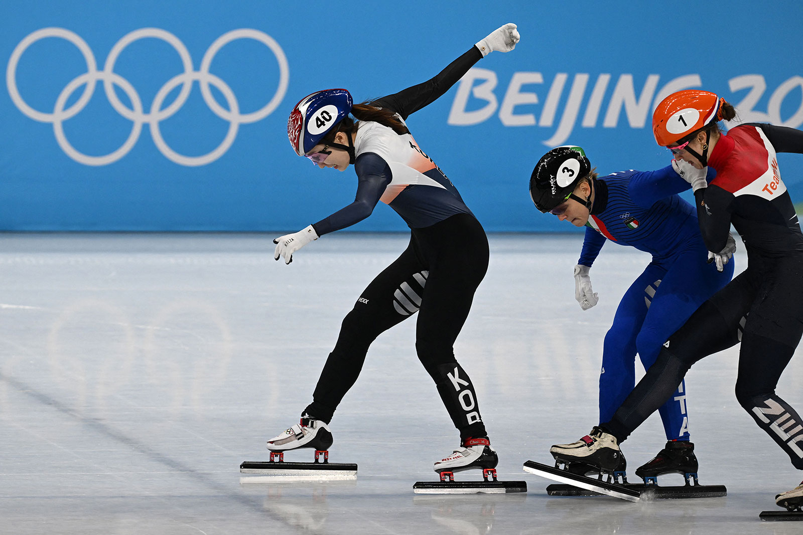 South Korea's Choi Min-jeong crosses the finish line ahead of Italy's Arianna Fontana and Dutch skater Suzanne Schulting to win the gold medal in the 1,500m short track on February 16.