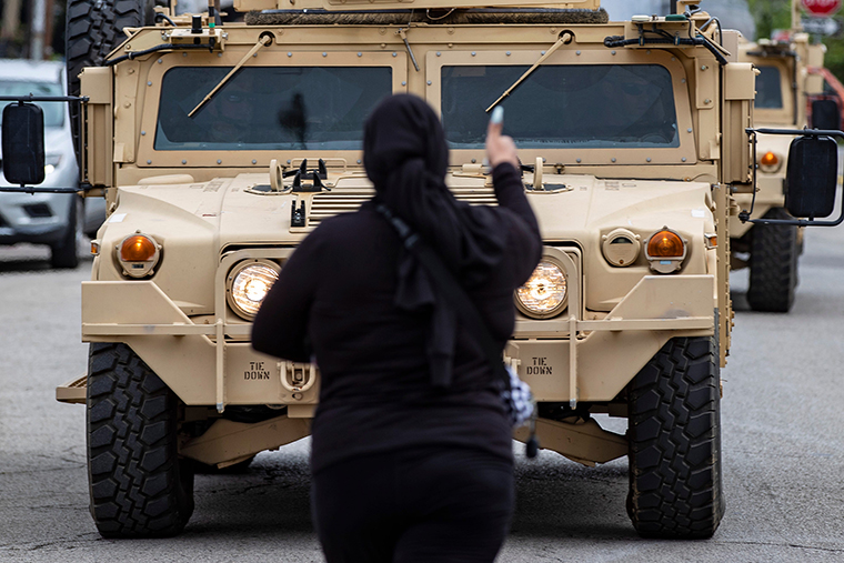 Luna J. confronts a National Guard vehicle after the Supreme Courts' decision in the Breonna Taylor case was announced Wednesday. September 23.