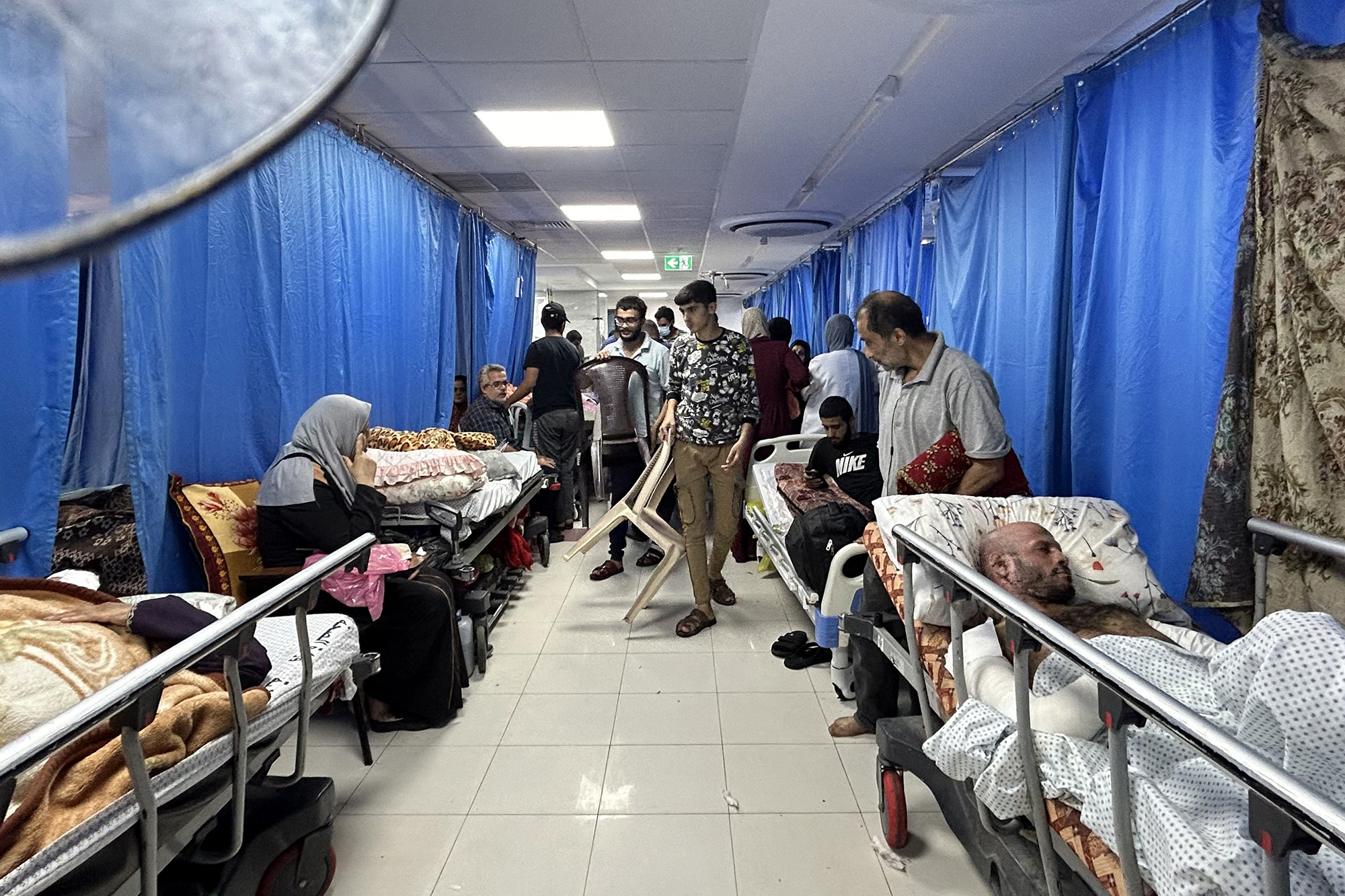 Patients and internally displaced people are pictured at Al-Shifa hospital in Gaza City on November 10.