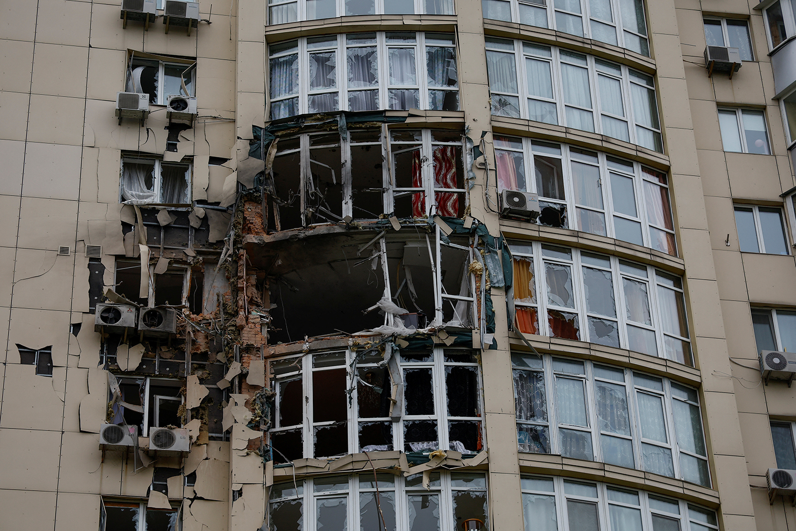 An apartment building damaged by remains of a drone shot down during a Russian overnight strike, in Kyiv, Ukraine on May 8.