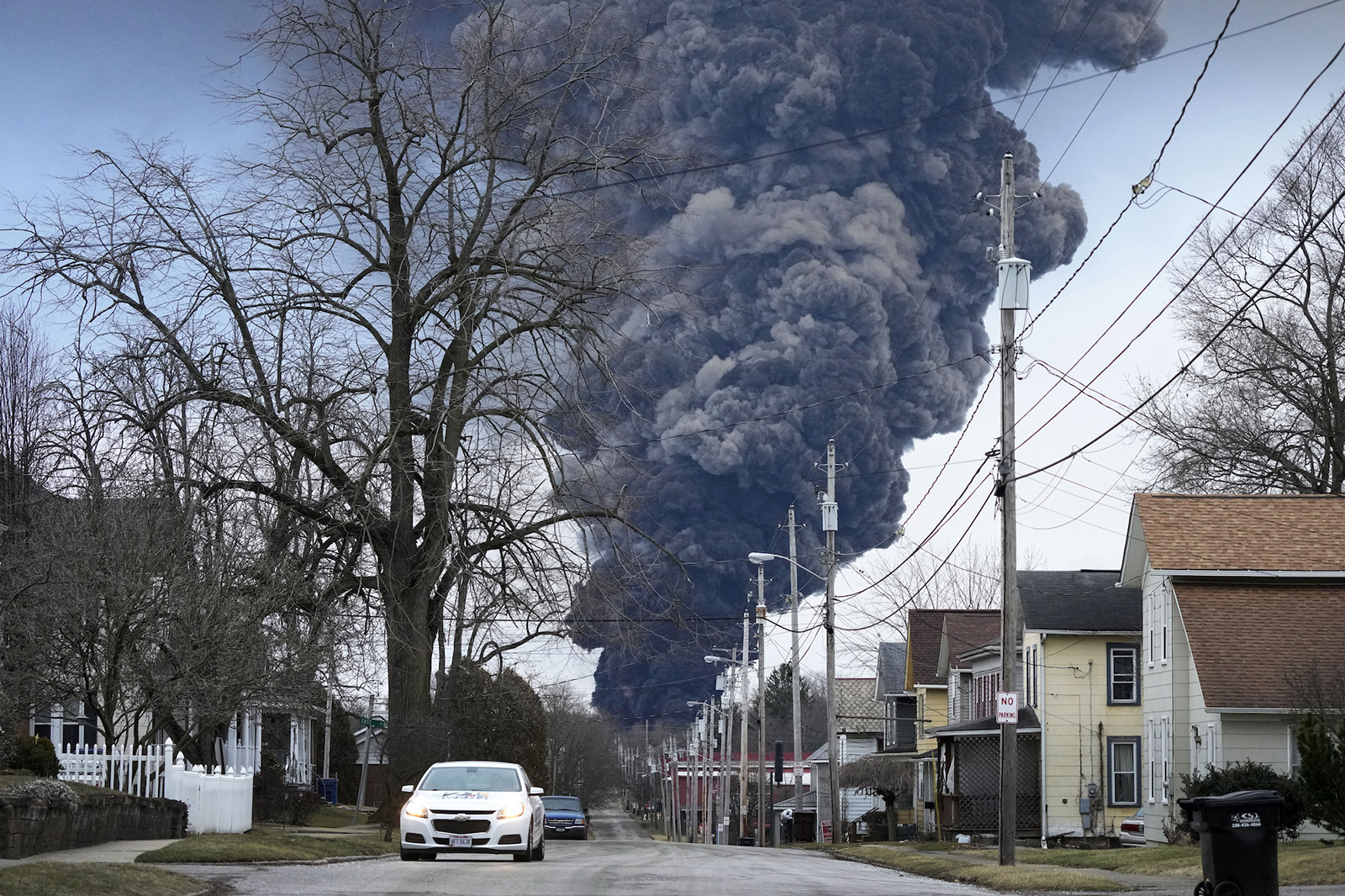 A black plume rises over East Palestine, Ohio, as a result of a controlled detonation of a portion of the derailed Norfolk Southern trains, on Feb. 6.