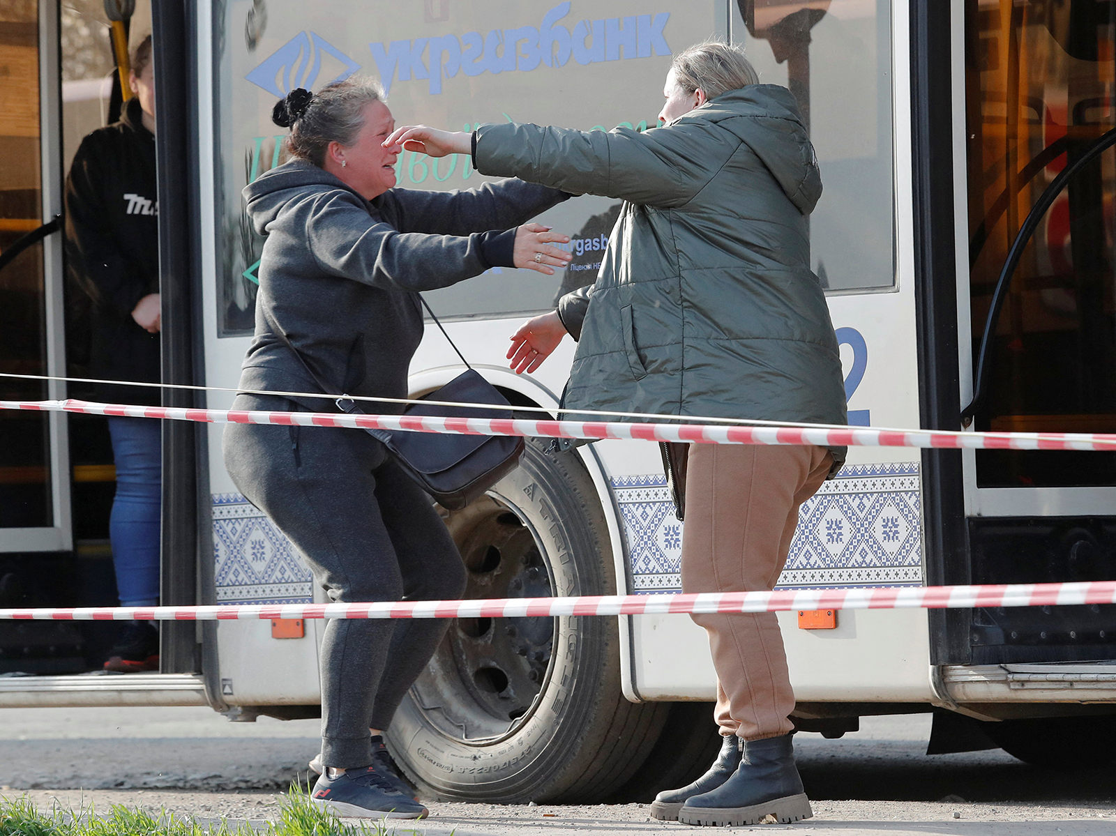 Azovstal steel plant employee Valeria (R), last name withheld, evacuated from Mariupol, hugs her sister Aleksandra as they meet at a temporary accommodation centre during Ukraine-Russia conflict in the village of Bezimenne in the Donetsk Region, Ukraine on May 1.